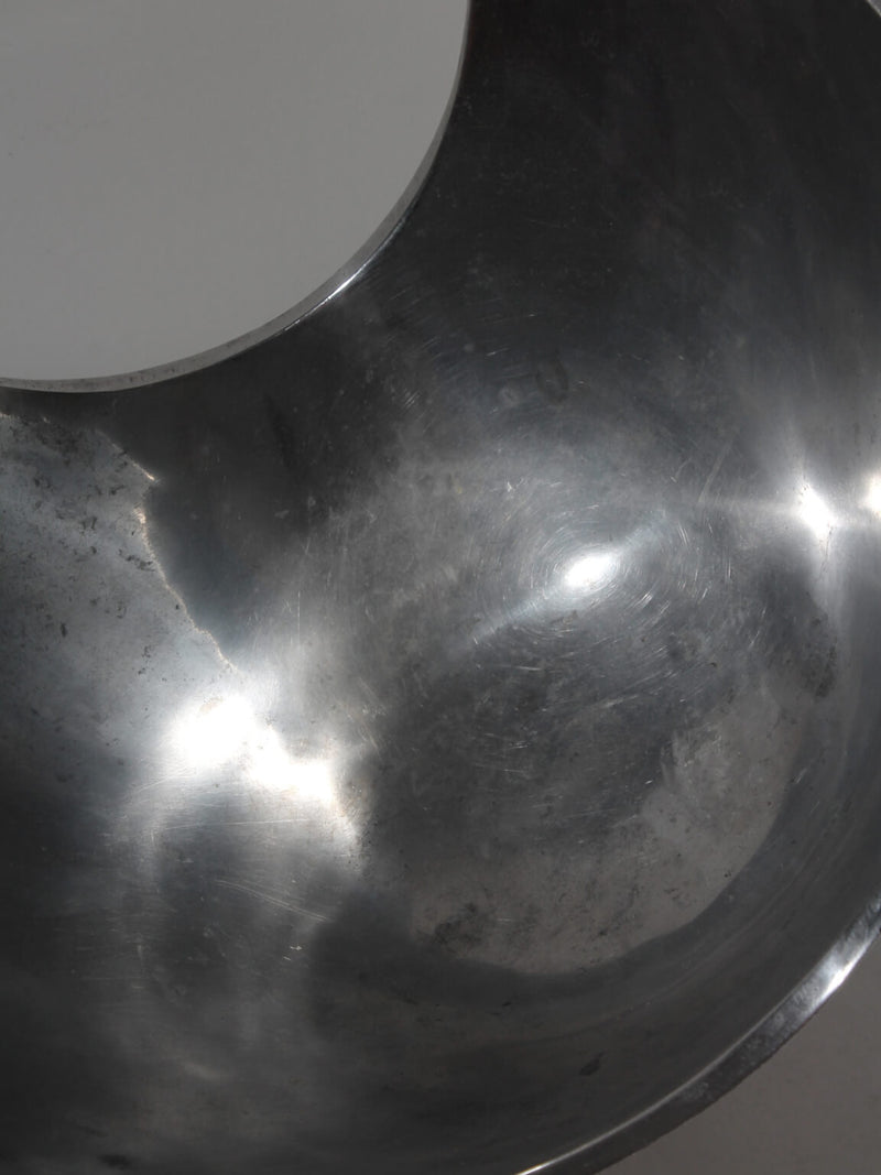 Polished Aluminum Asymmetric Contemporary Large Deep Bowl — close-up of polished aluminum surface