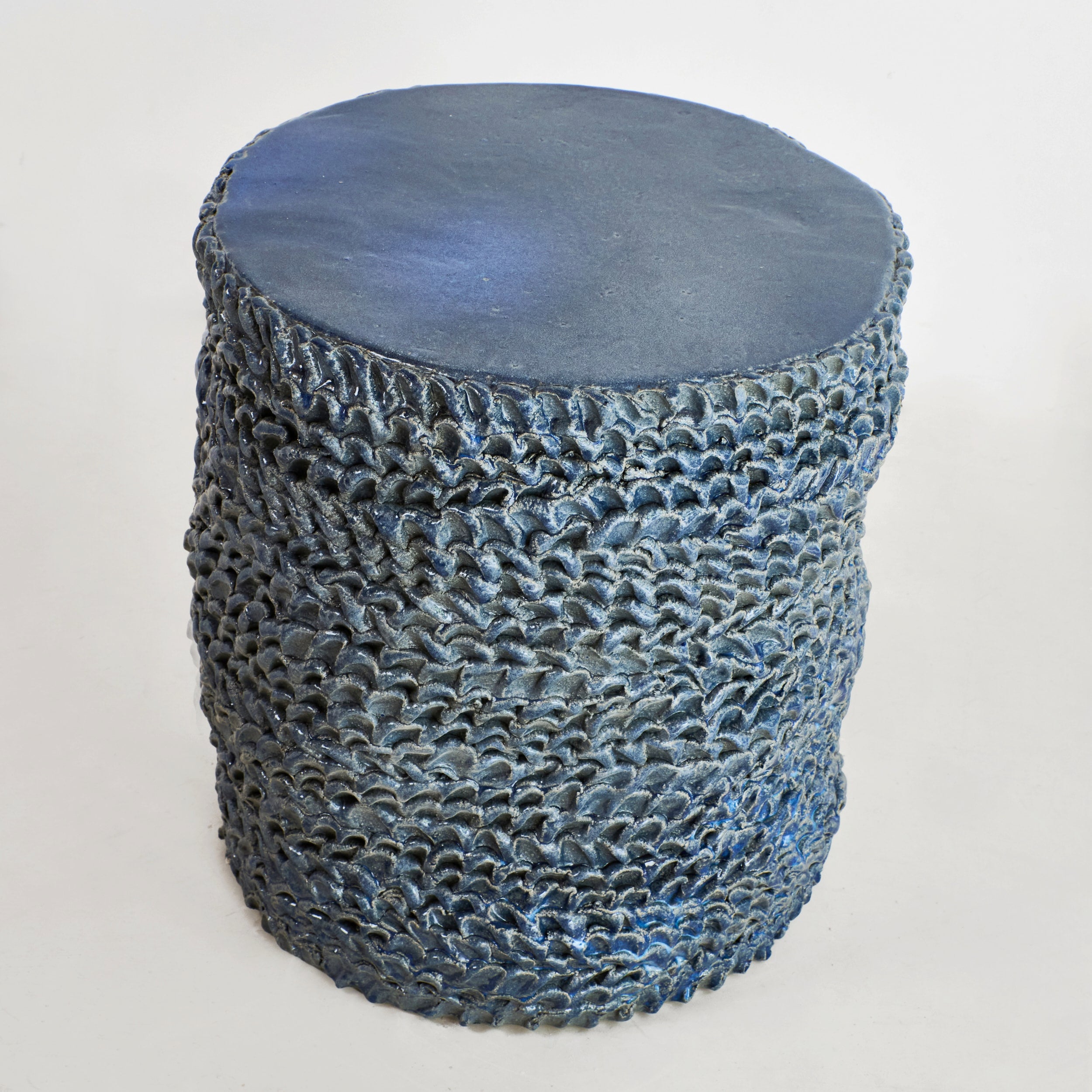 Casa Ceramic Side Table — close-up of textured blue ceramic surface