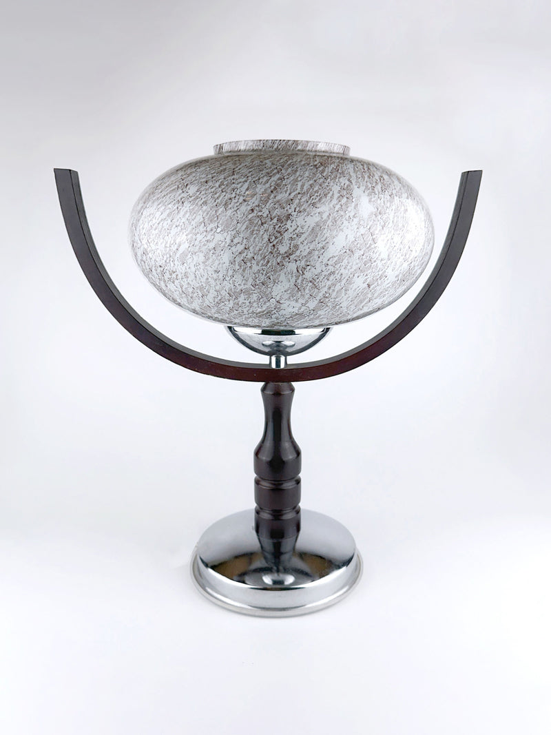 The 1960s Sputnik Age Table Lamp by Dodo Vintage features a round, textured white shade, dark curved arms, and a black and silver base, offering clean, minimalist style against a plain white background.