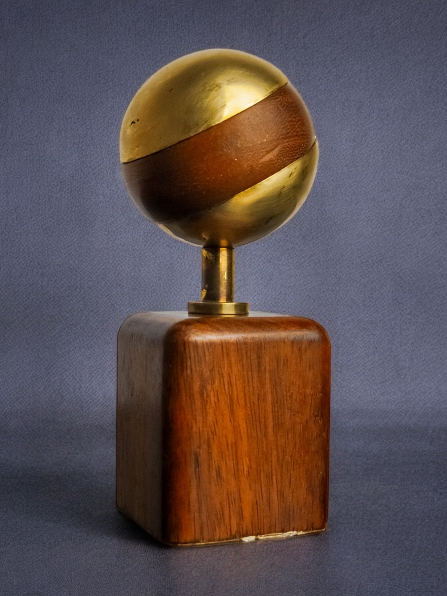 Brutalist sculpture by Ardisur, paperweight, wood and bronze, Spain 1970 — side angle showing brass sphere atop wooden base