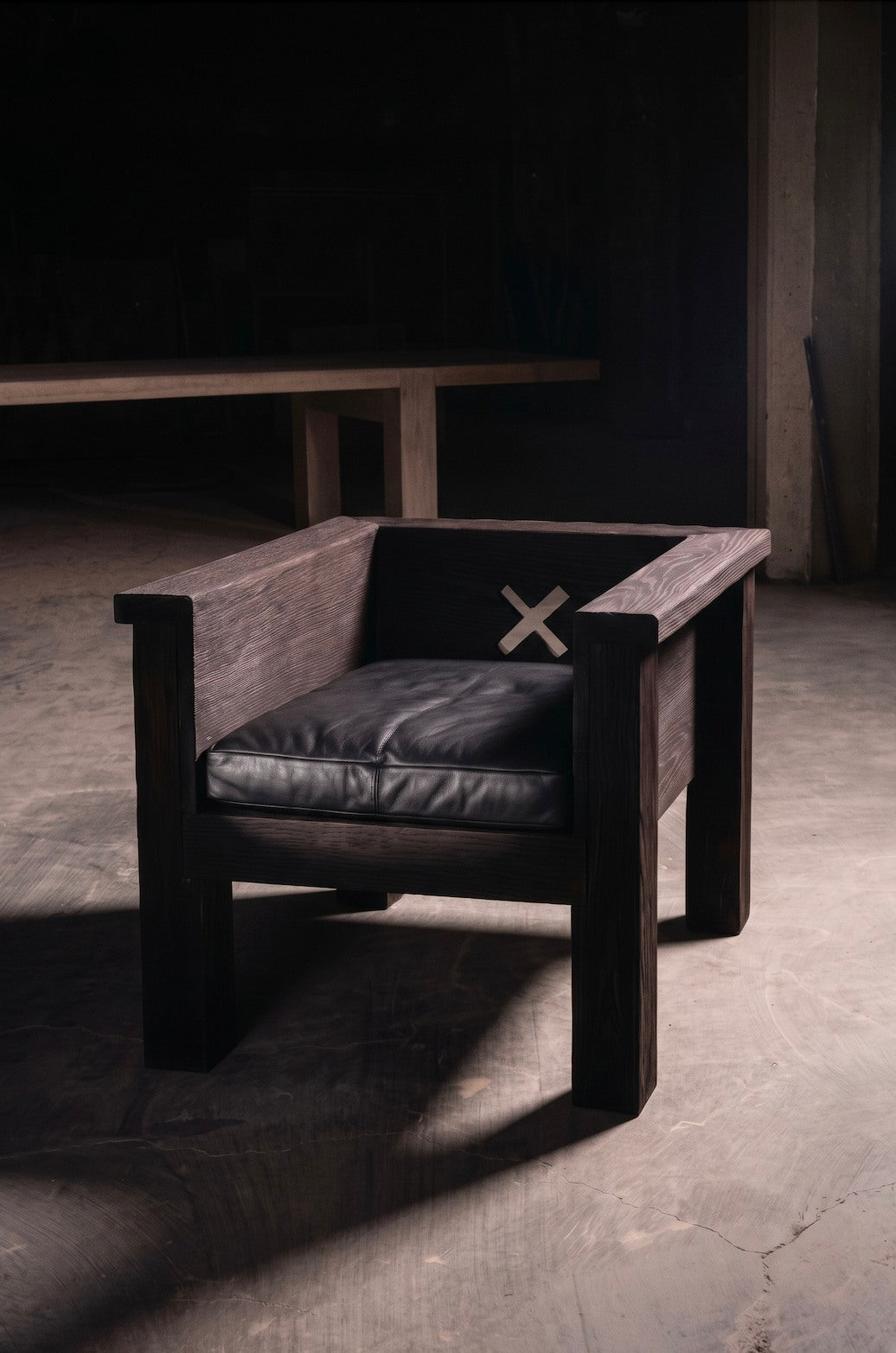 Tephra Lounge Chair in Leather and Oak — close-up