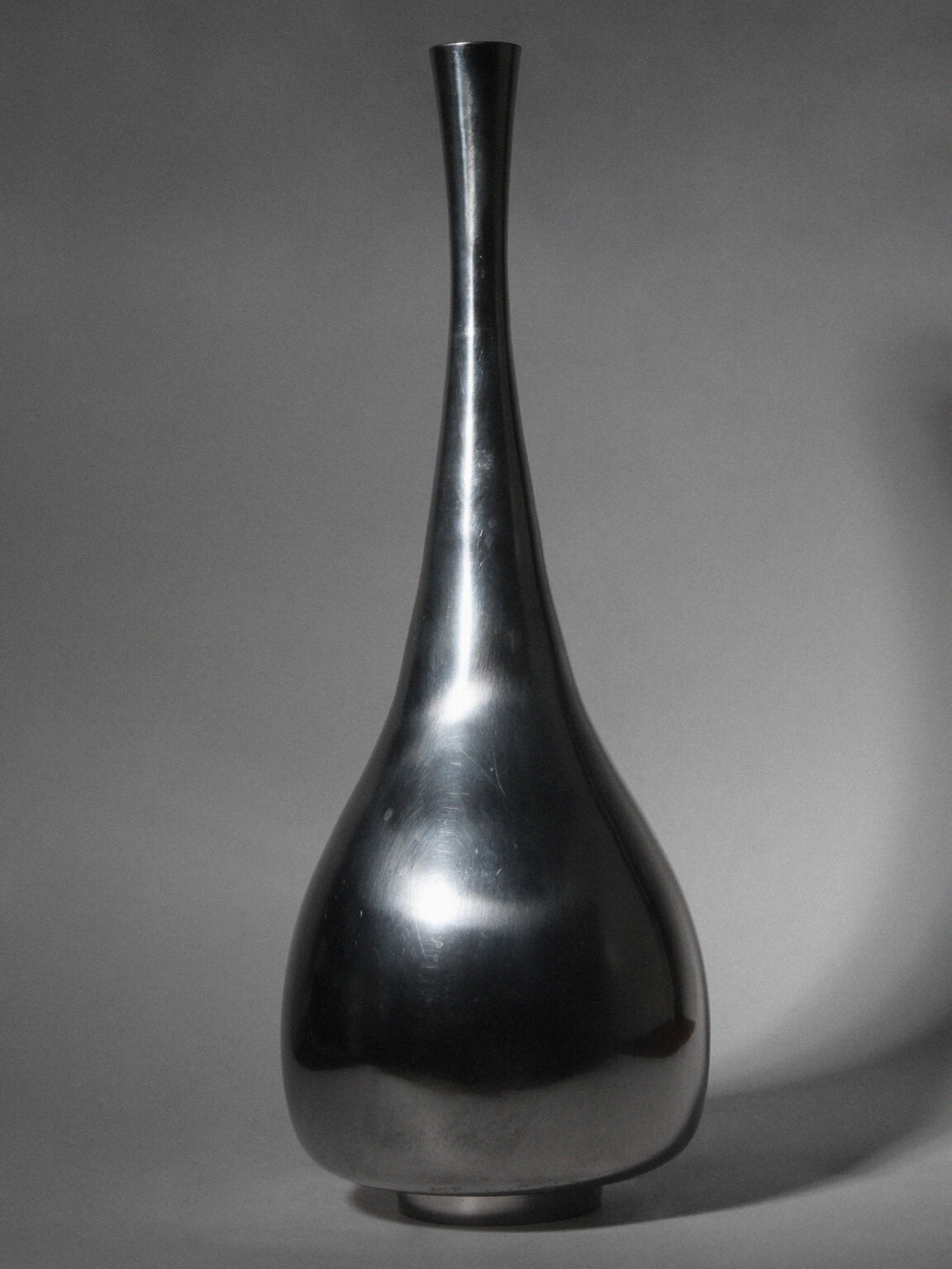 Polished Aluminum Teardrop Tall Vase — detail view
