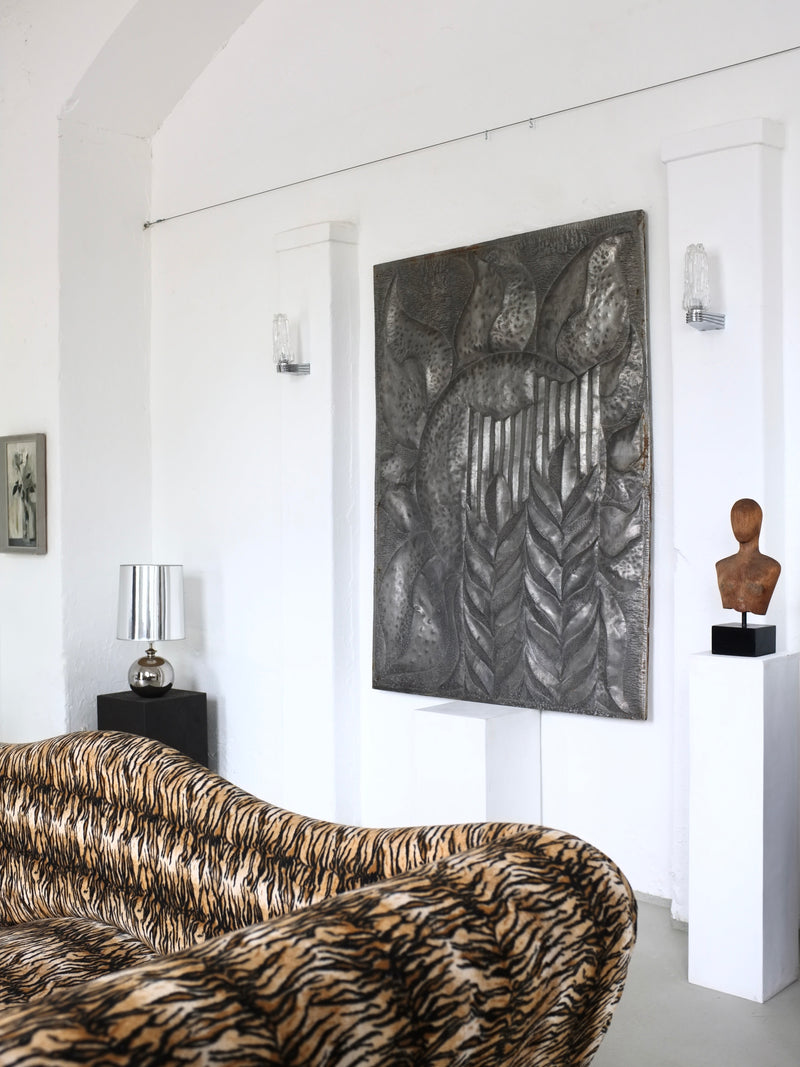 Postmodern animal print sofa in elegant white interior setting