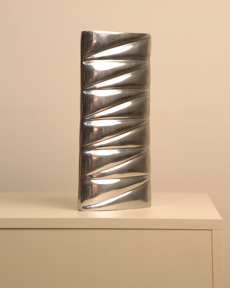 Polished aluminum vase with diagonal ribbed pattern, 1980s vintage