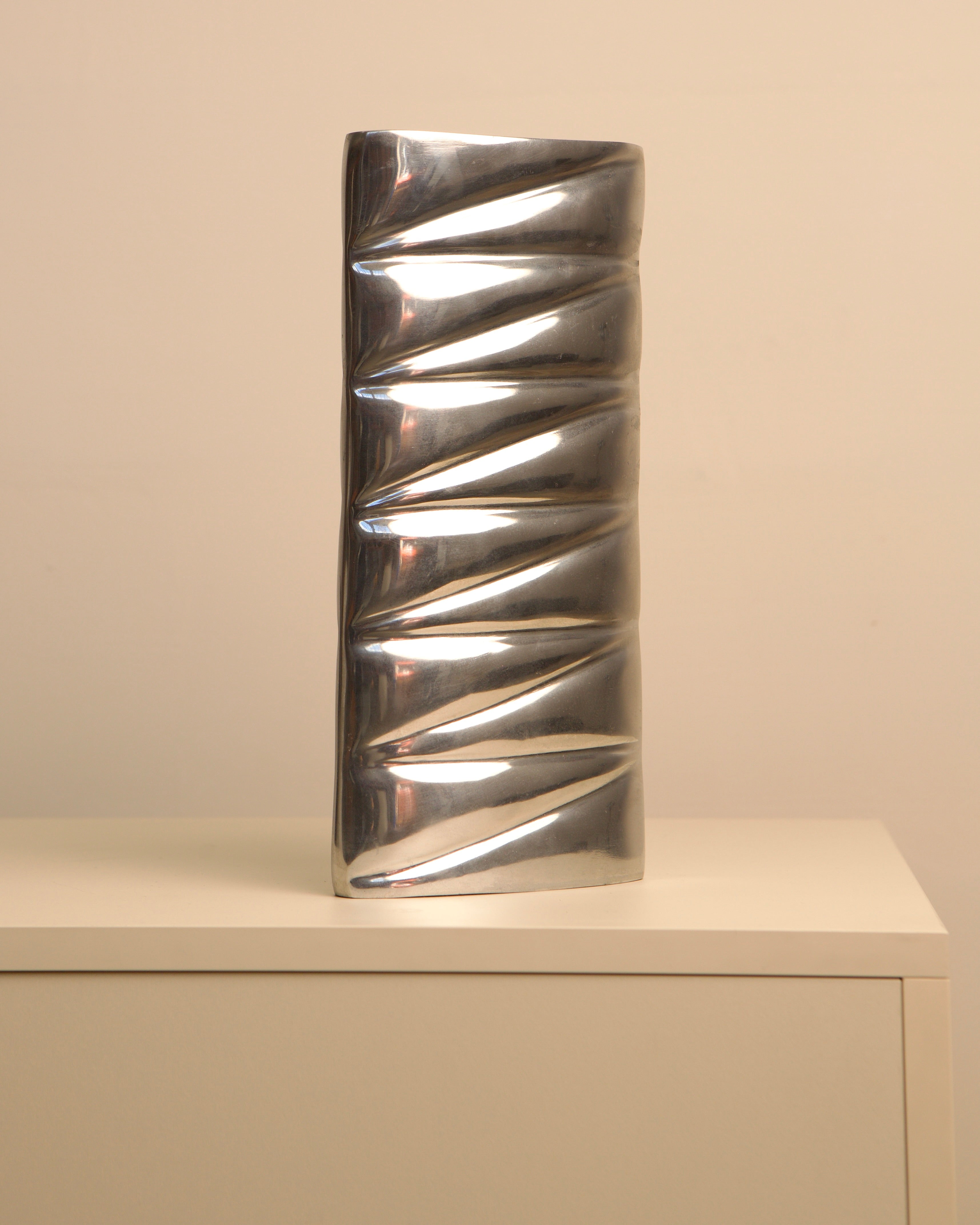 Polished aluminum vase with diagonal ribbed pattern, 1980s vintage