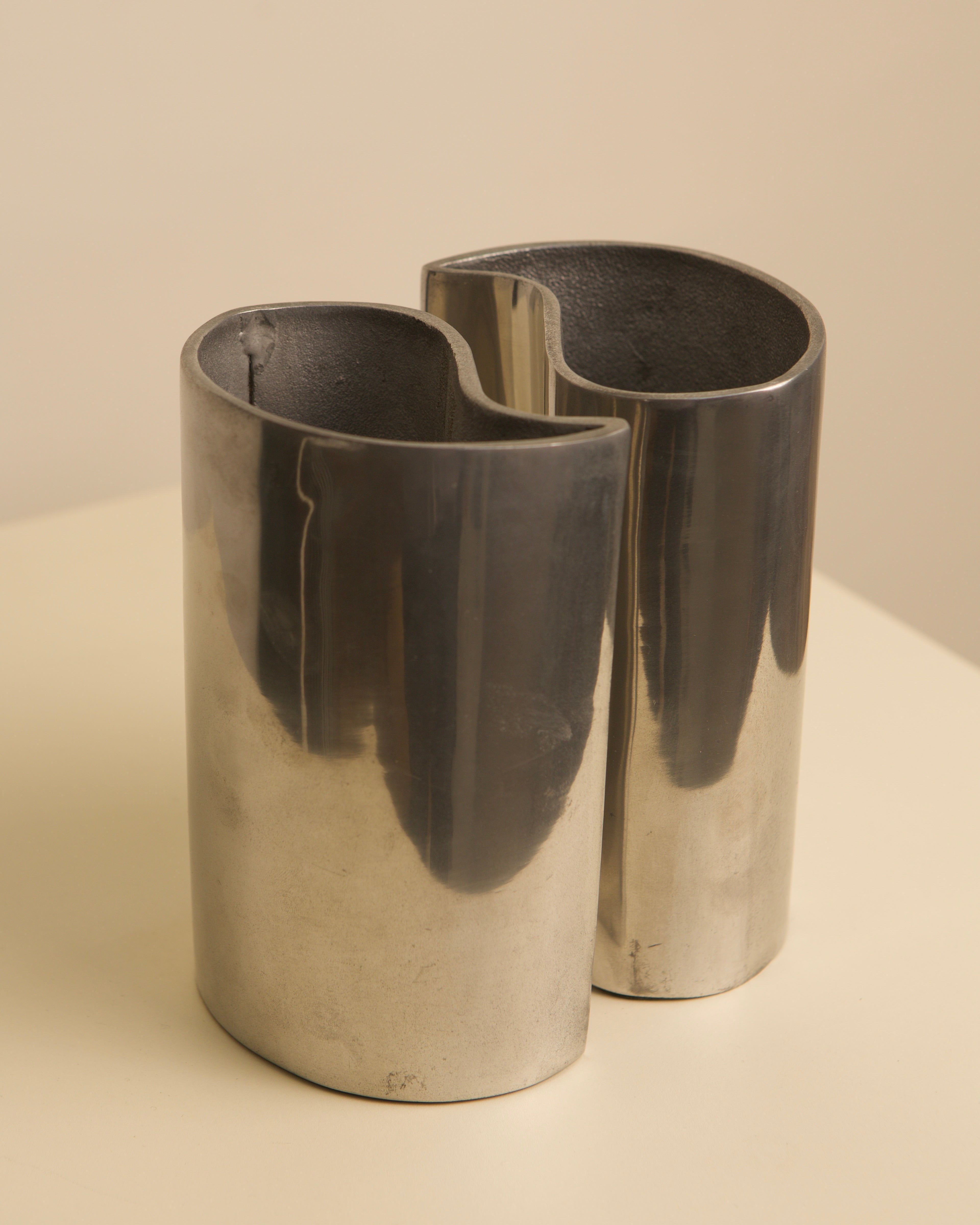 Pair of interlocking aluminum Yin Yang vases, 1980s design detail