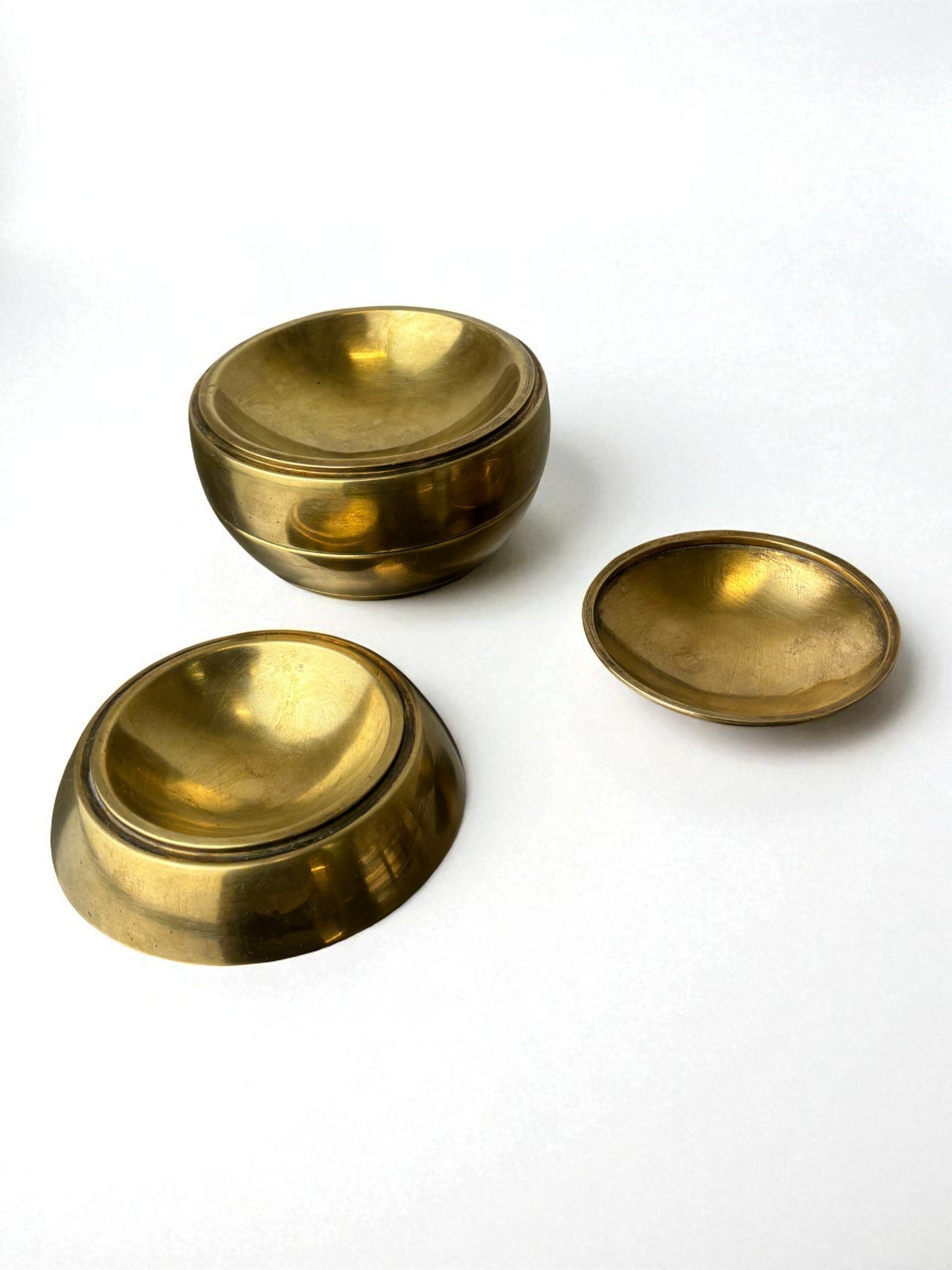 Spheric Stacked Ashtrays by Tommaso Barbi in Brass, Italy, 1970s — lifestyle setting