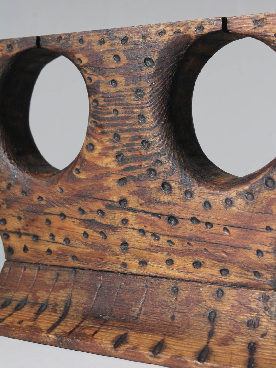 Vintage Swedish Carved Wood Candlelabra — close-up of textured wood surface