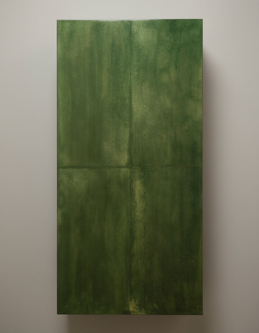 The Galerie Vauvart Green Parchment Table, rectangular with a subtly textured finish in Aldo Tura style, is shown from above resting on a beige, speckled carpet.