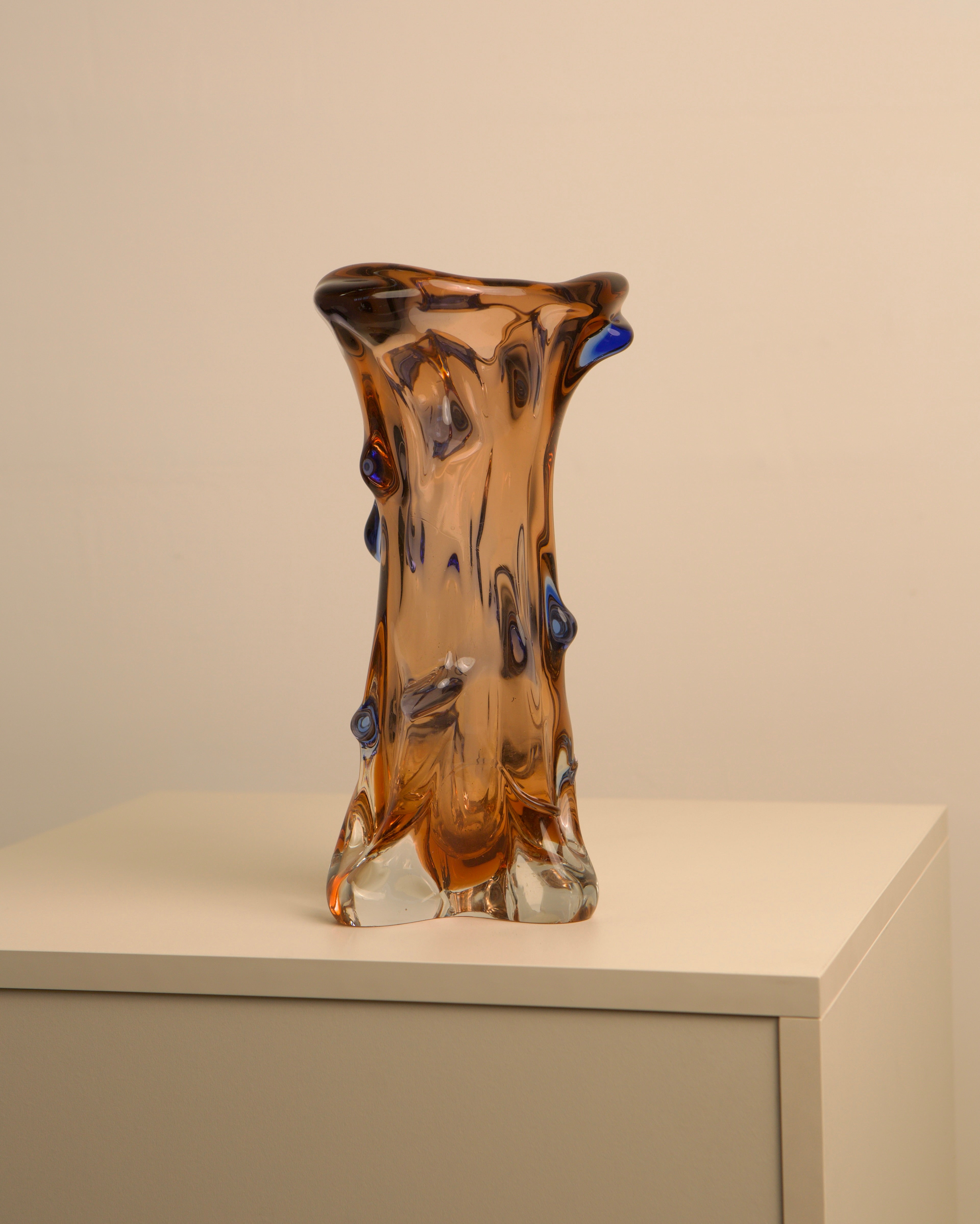 Amber Murano glass vase with blue accents, organic flowing form