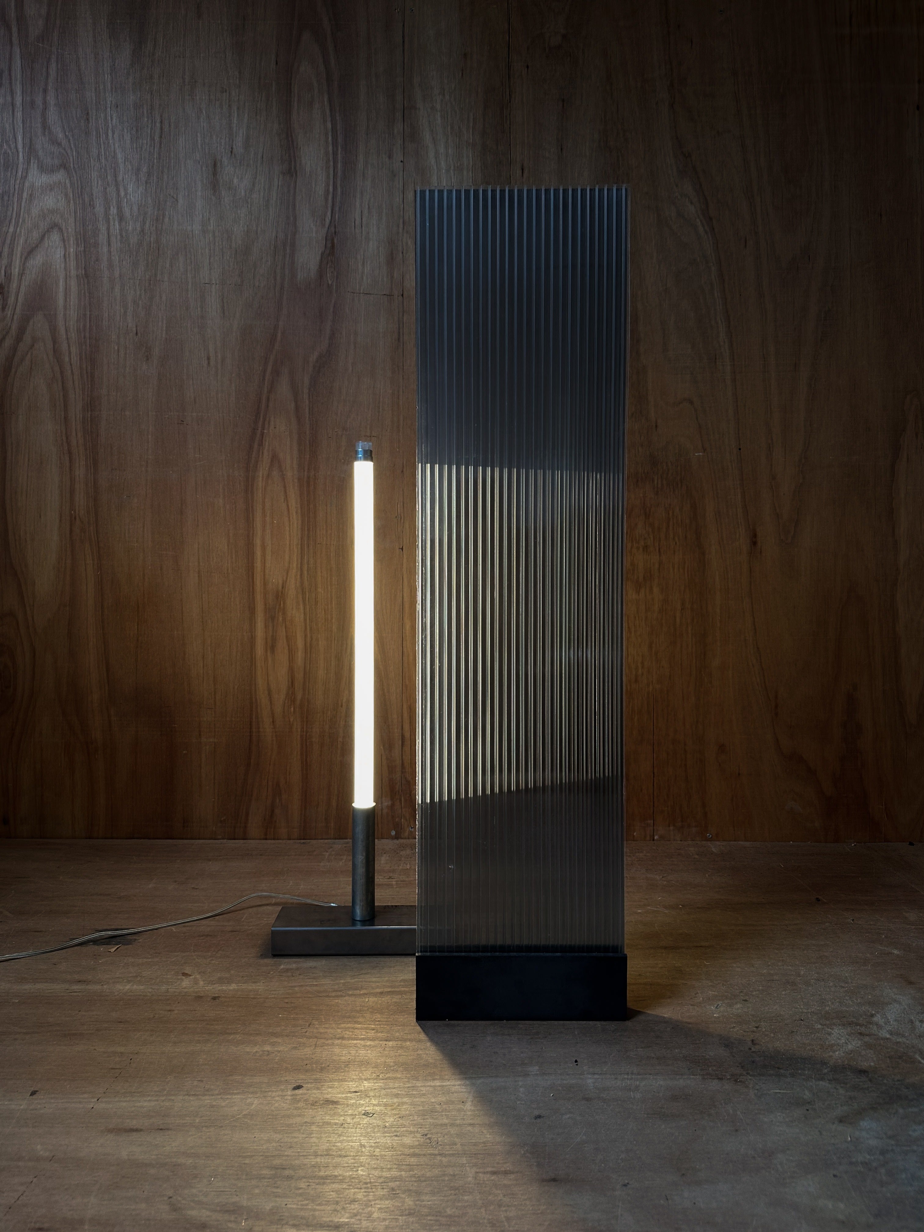 POLY-C-1 extra tall - smoke — side angle with ribbed glass and metal base