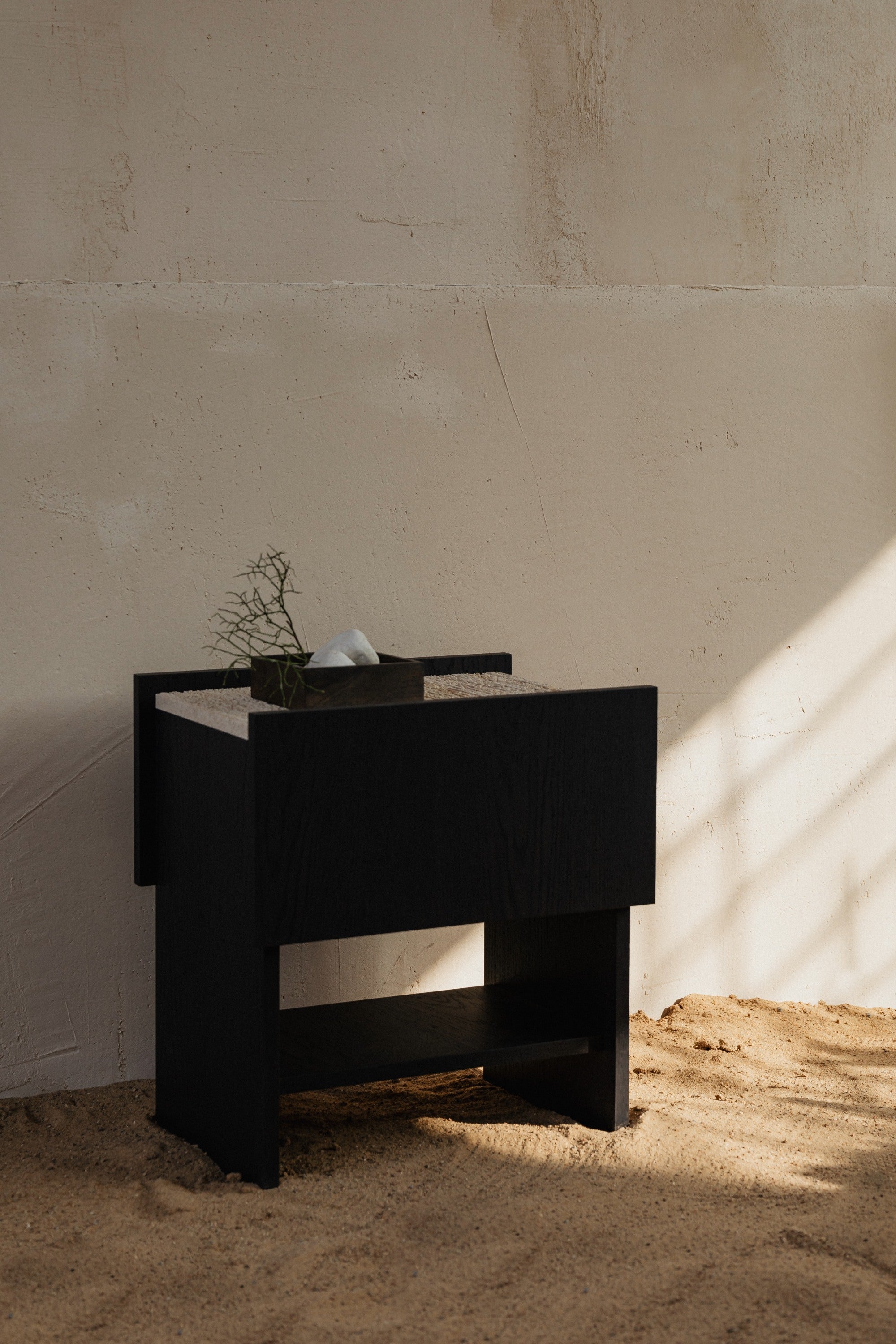 NOTO Night Stand — black wood nightstand in minimalist setting