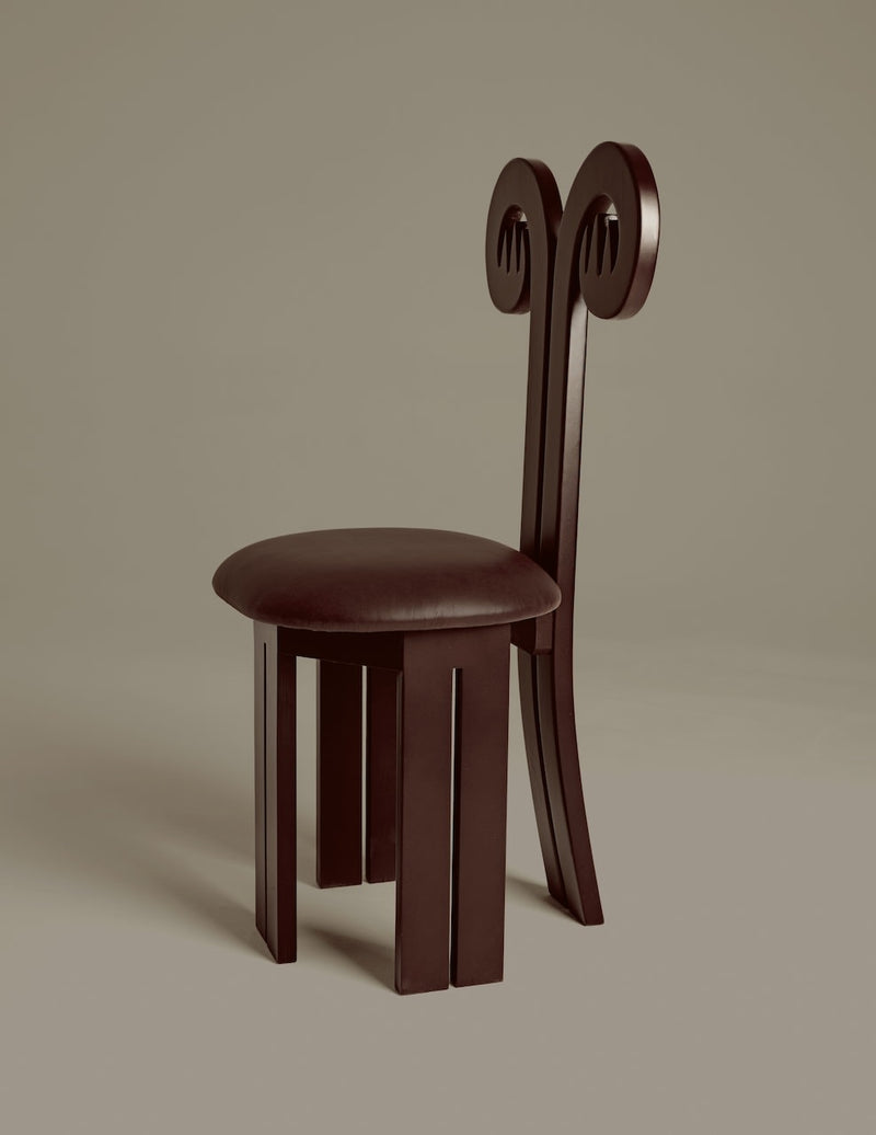 Dark walnut Fiamma chair with curved backrest and round seat