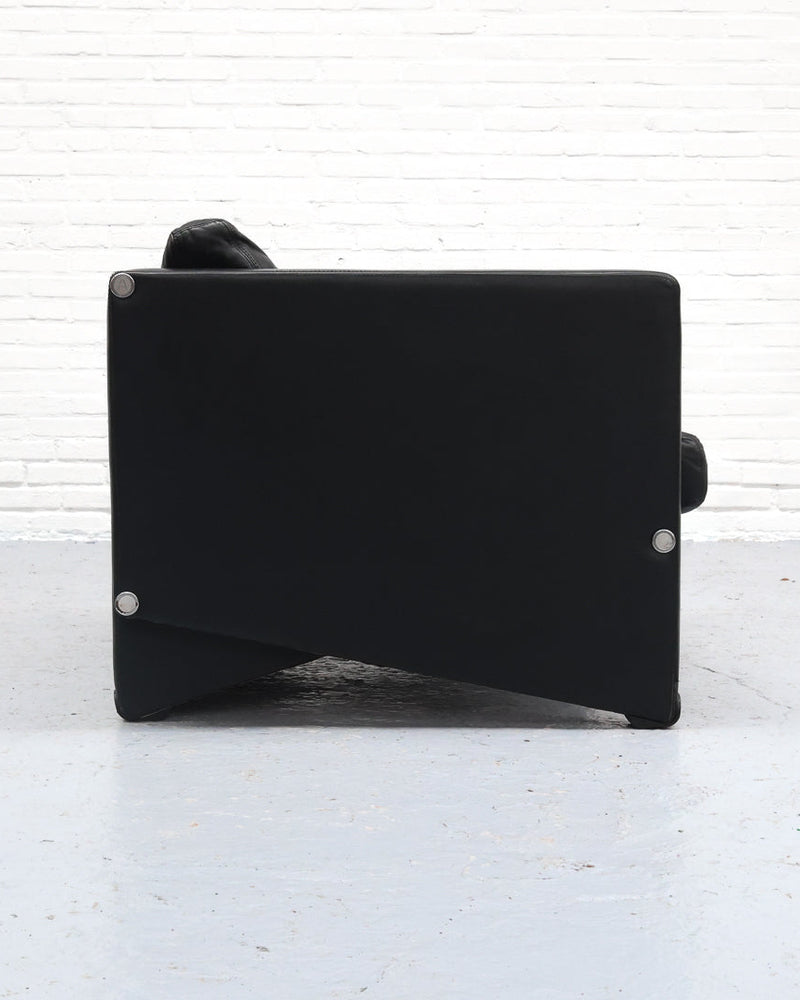 Back view of black Artifort Triangel chair showing angular design