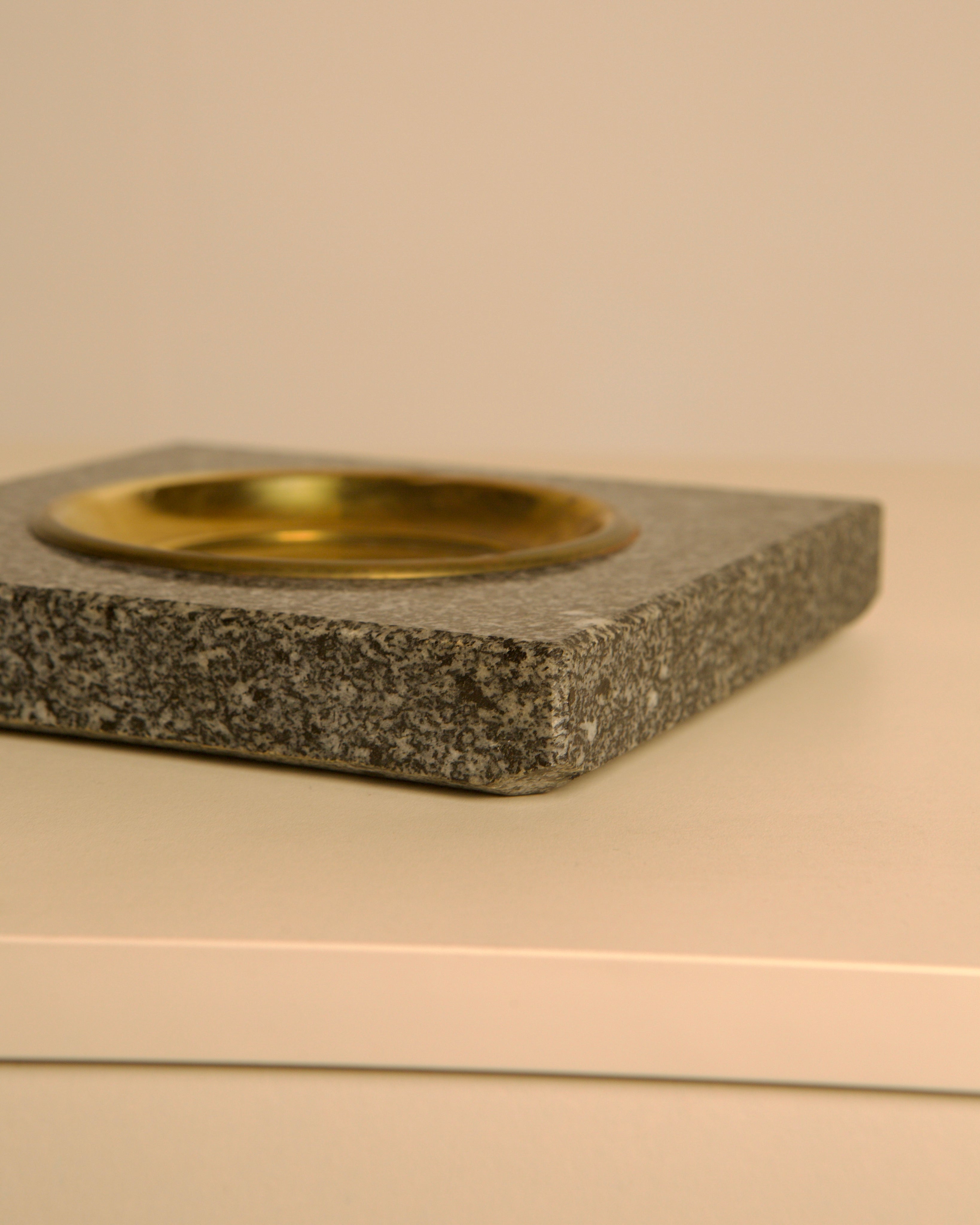 Italian granite and brass vide-poche, 1960s  — in context