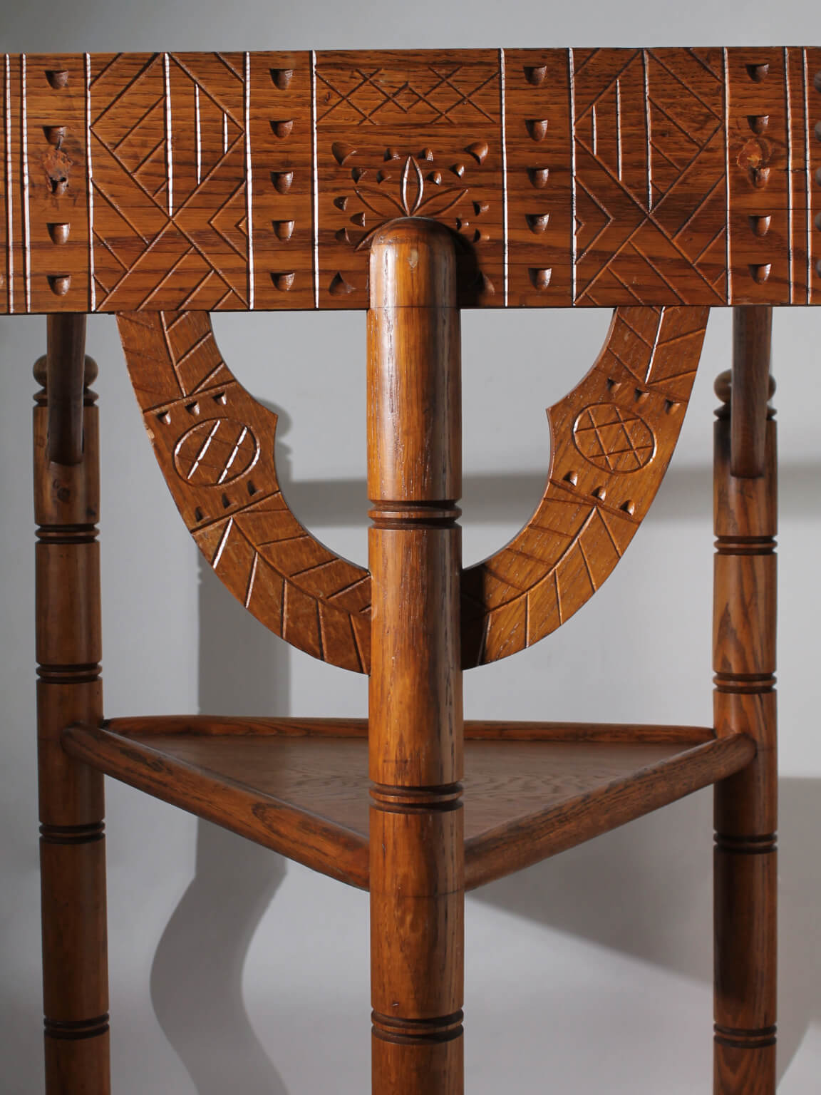 Swedish Carved Oak Monk Chair — front view highlighting intricate carvings