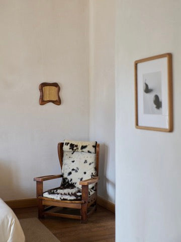 Minho Mirror Oak — back view on wall in minimalist room