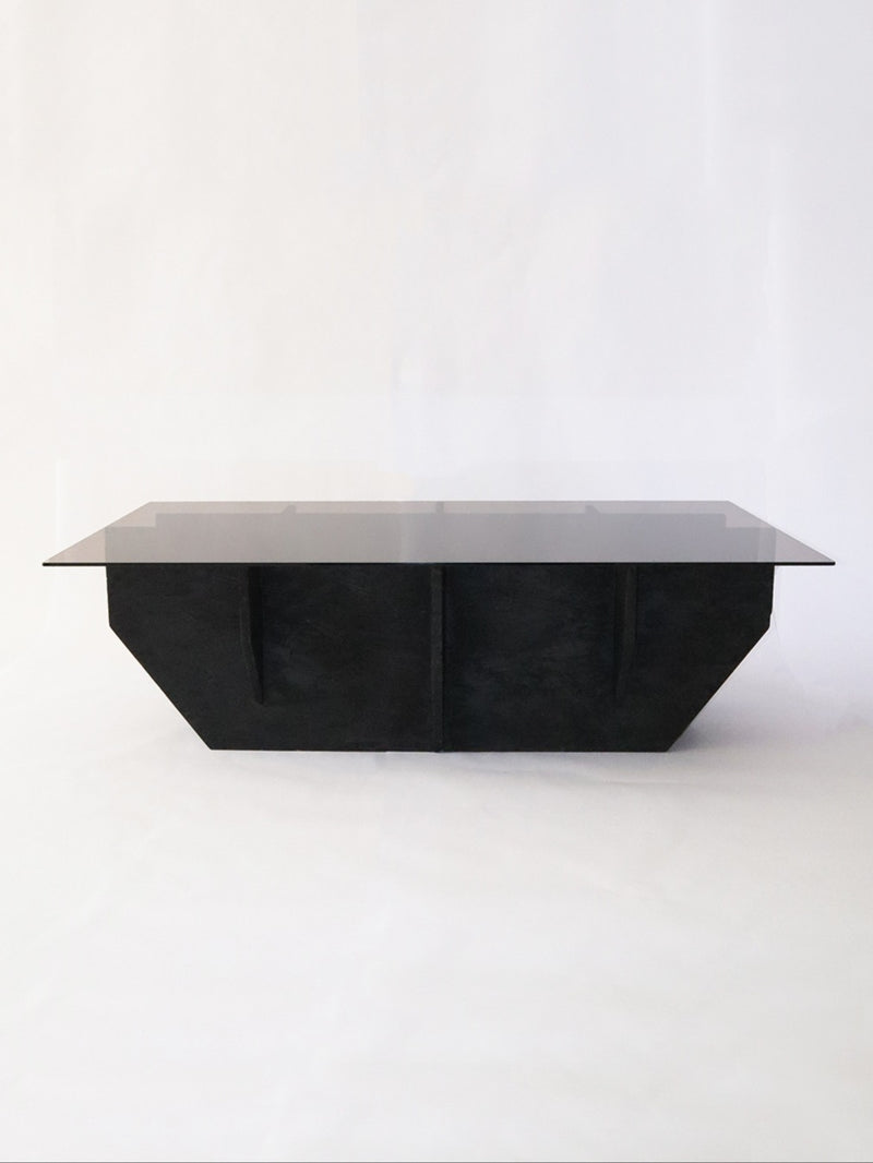 Coal coffee table with angular black base and dark glass top by Arthur Bitsch