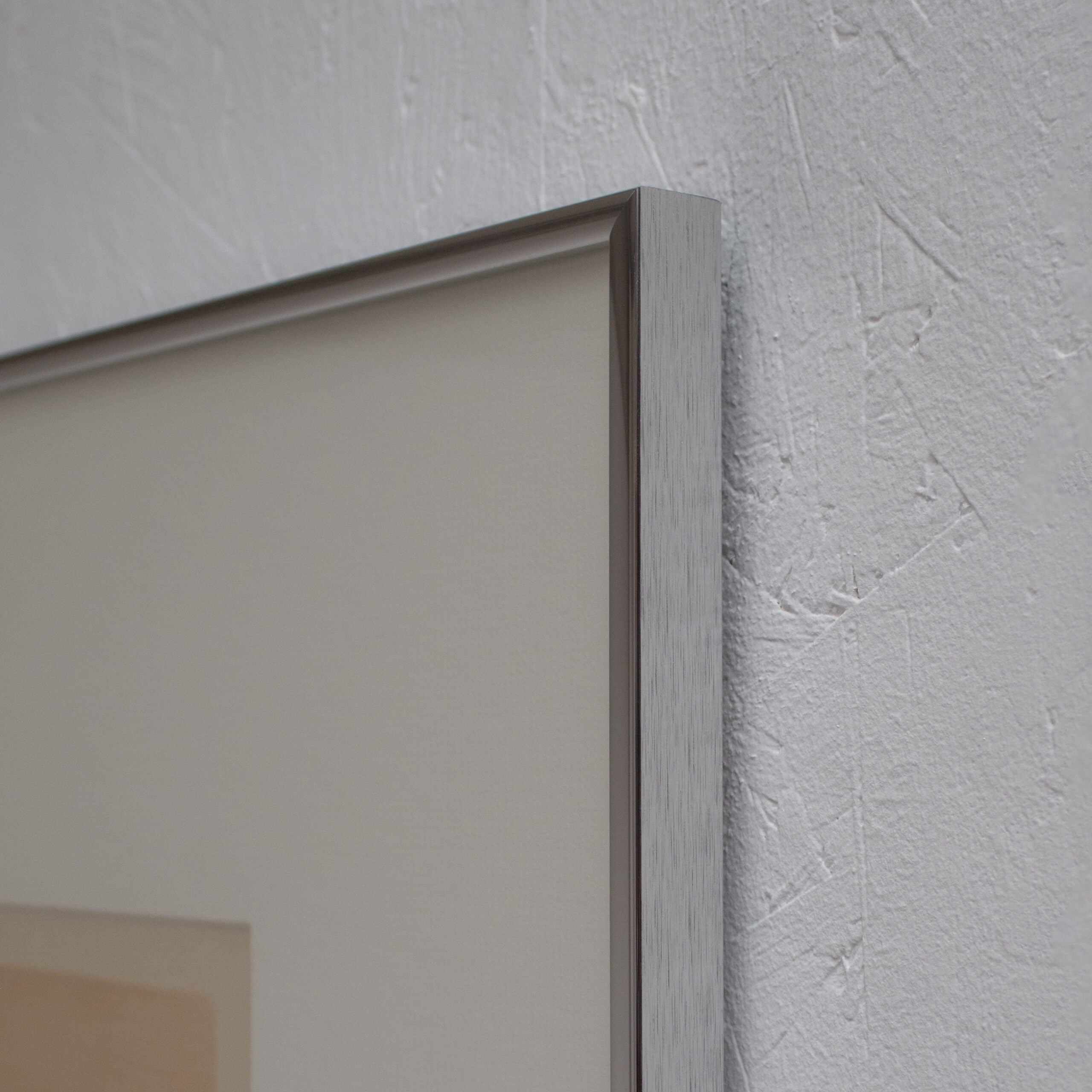 Mid Century Italian Work on Paper, 1977 — close-up of silver frame edge