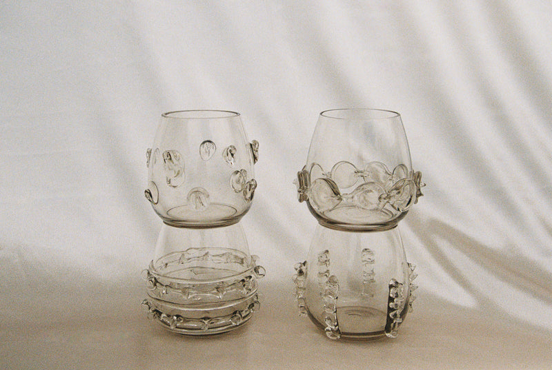 Contemporary Tumblr - Set of four handblown glass vessels — close-up of textured glass details