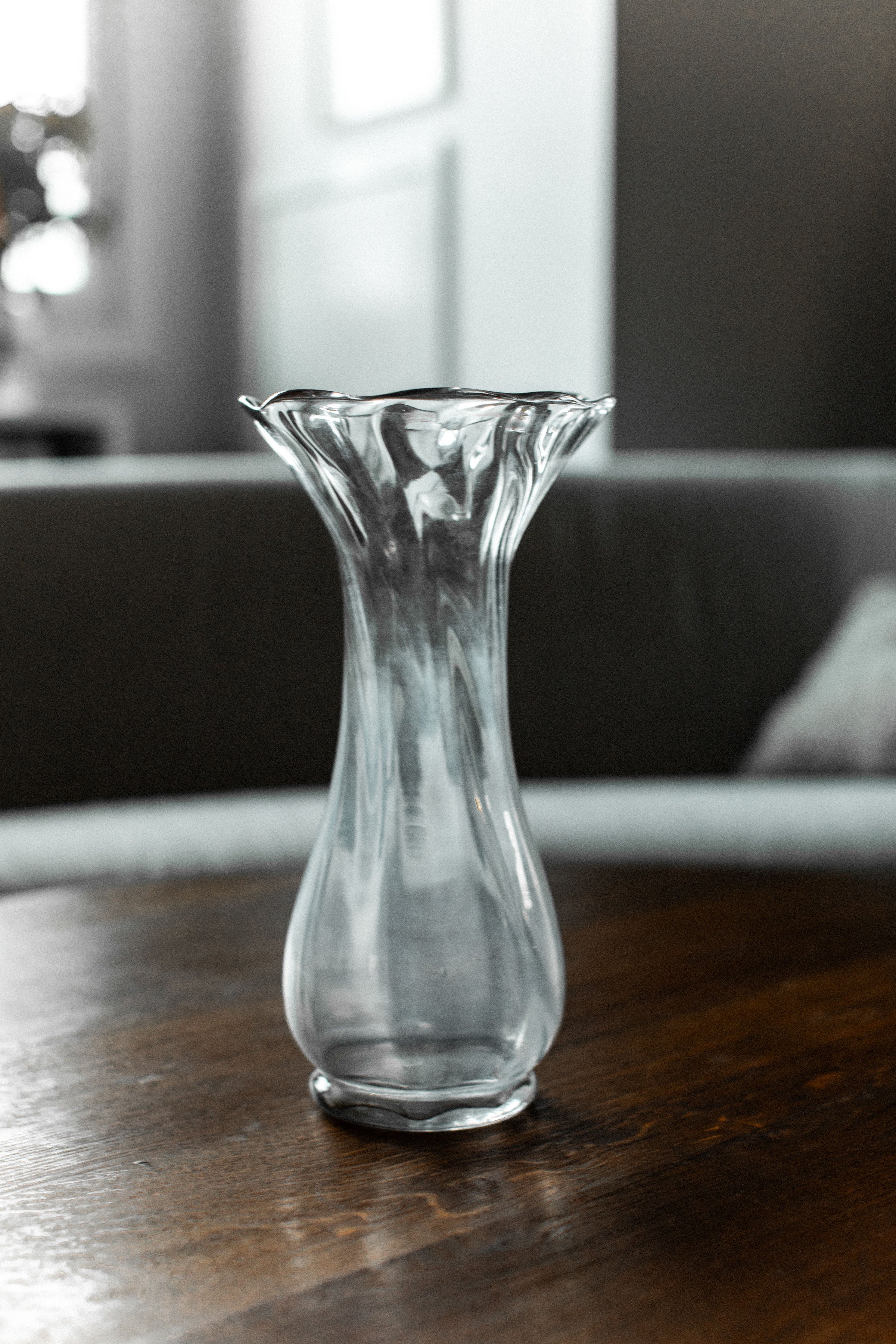 Glass Vase — back view on wooden table with soft lighting