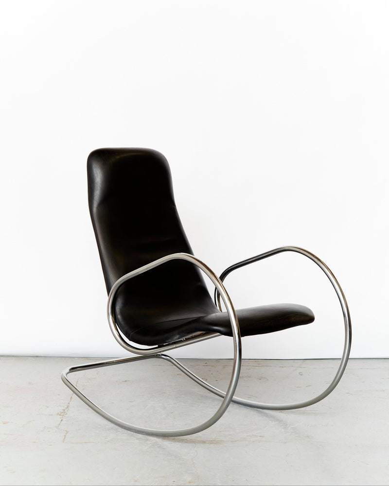 Modern chrome cantilever rocking chair with black leather upholstery