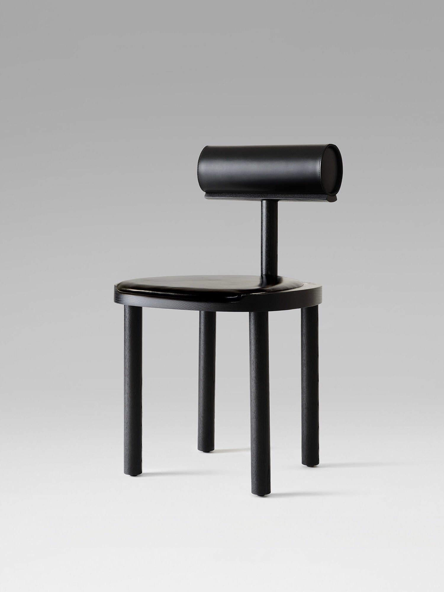 UNA Chair by Estudio Persona — side view of black wooden chair