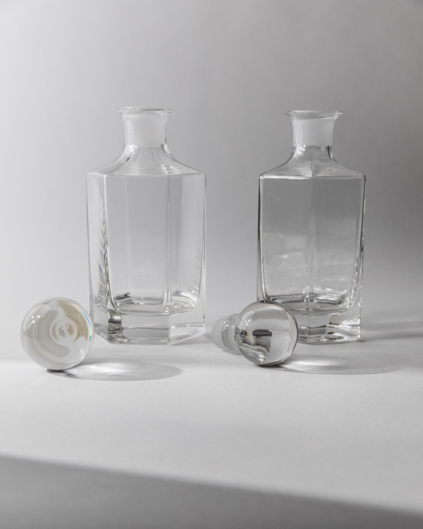 1970s Glass Decanter Set of 2 — side angle with clear glass decanters