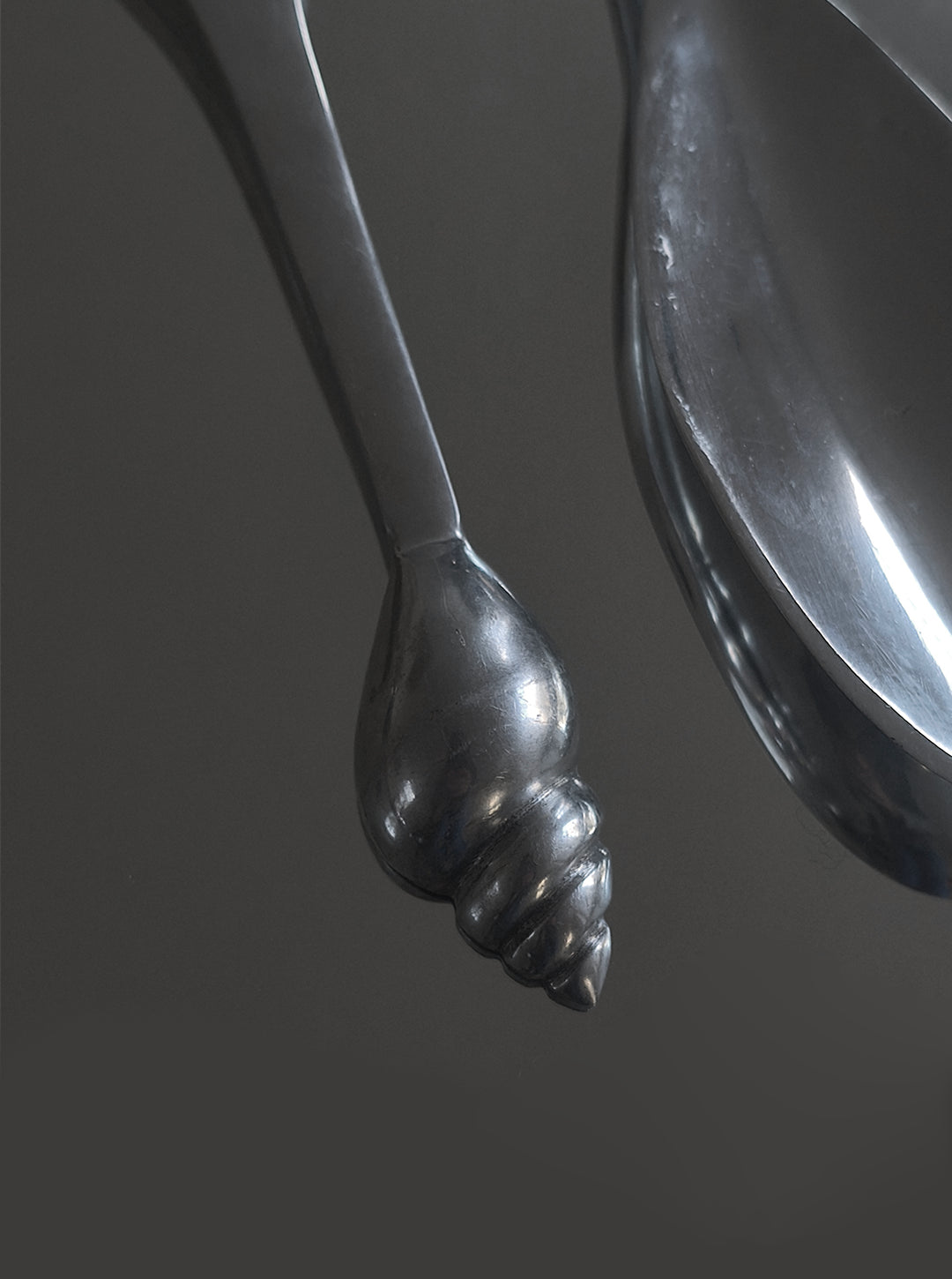 Shell Salad Cutlery Set — close-up of polished metal shell handle