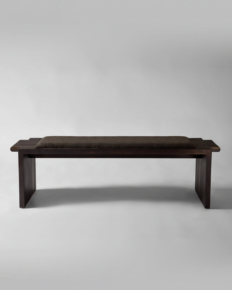 Upholstered Plank Bench by fern | The Oblist — dark wood, upholstered seat