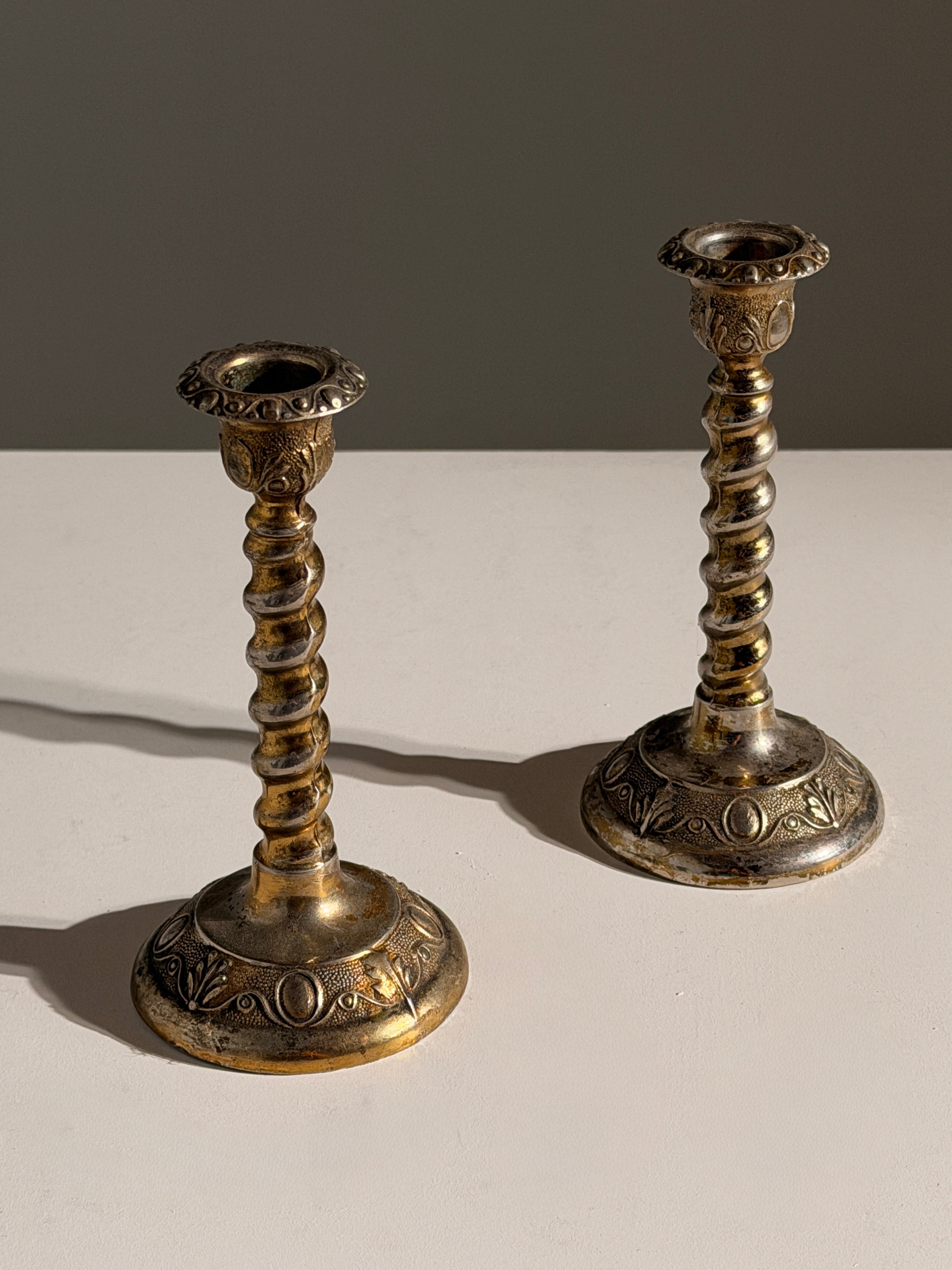 Pair of silver-plated candle holders, England — detail view