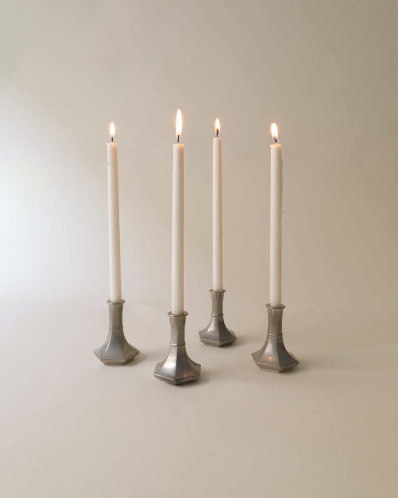 Four lit pewter candleholders by Just Andersen 1930s vintage design