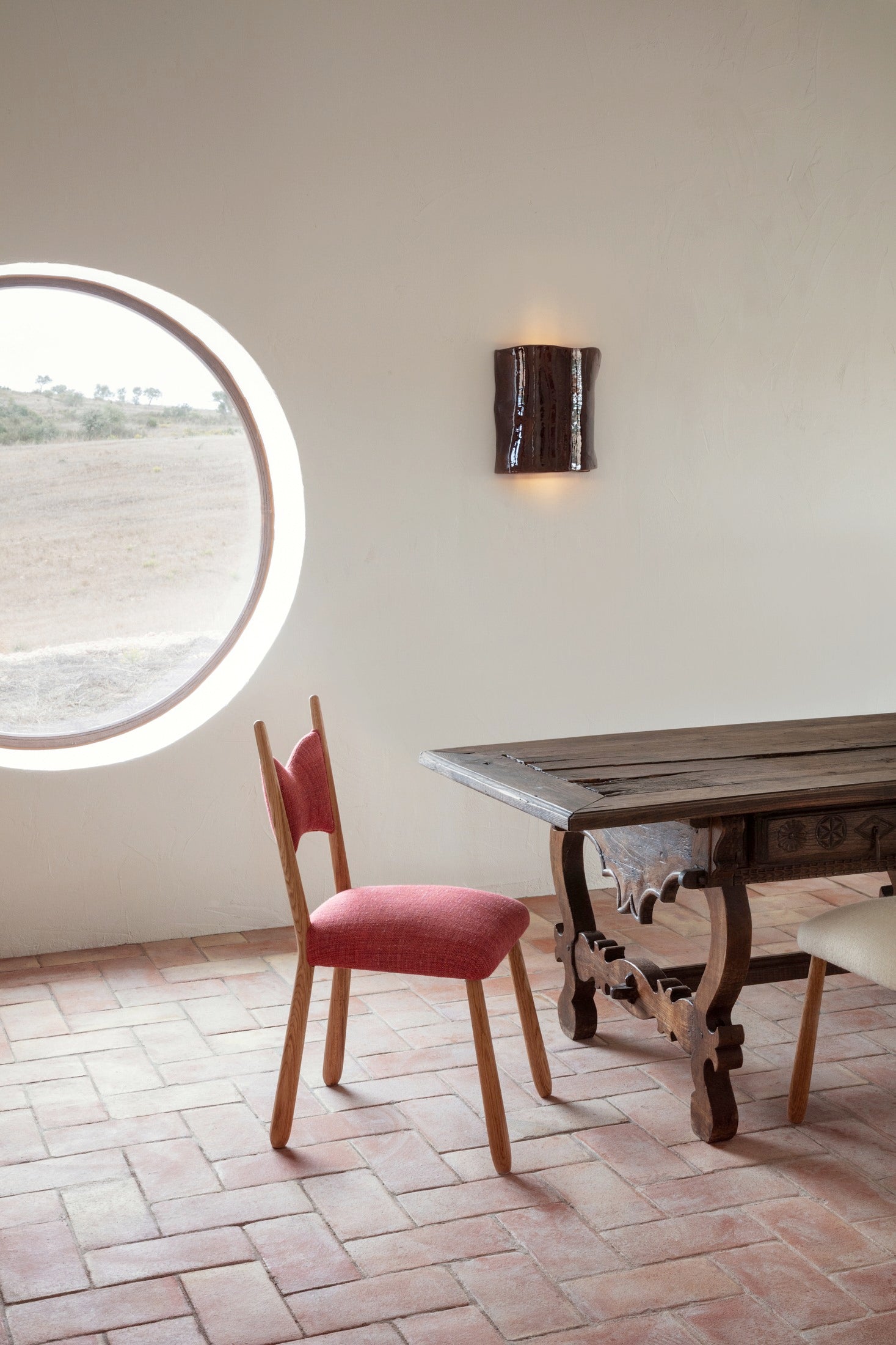 Papel Wall Light — side view mounted above rustic wooden table