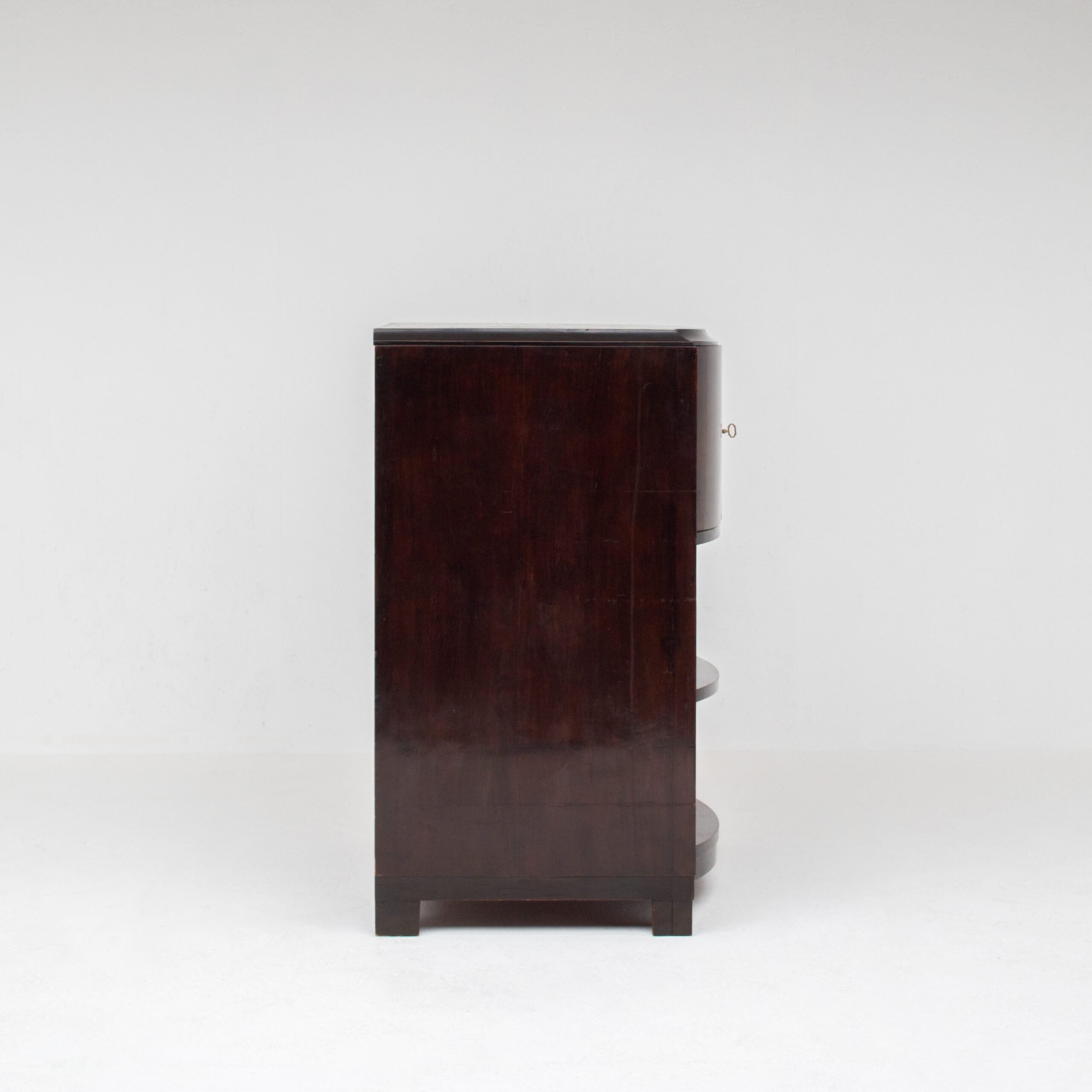 Art Deco Cabinets — side profile of dark wood nightstand