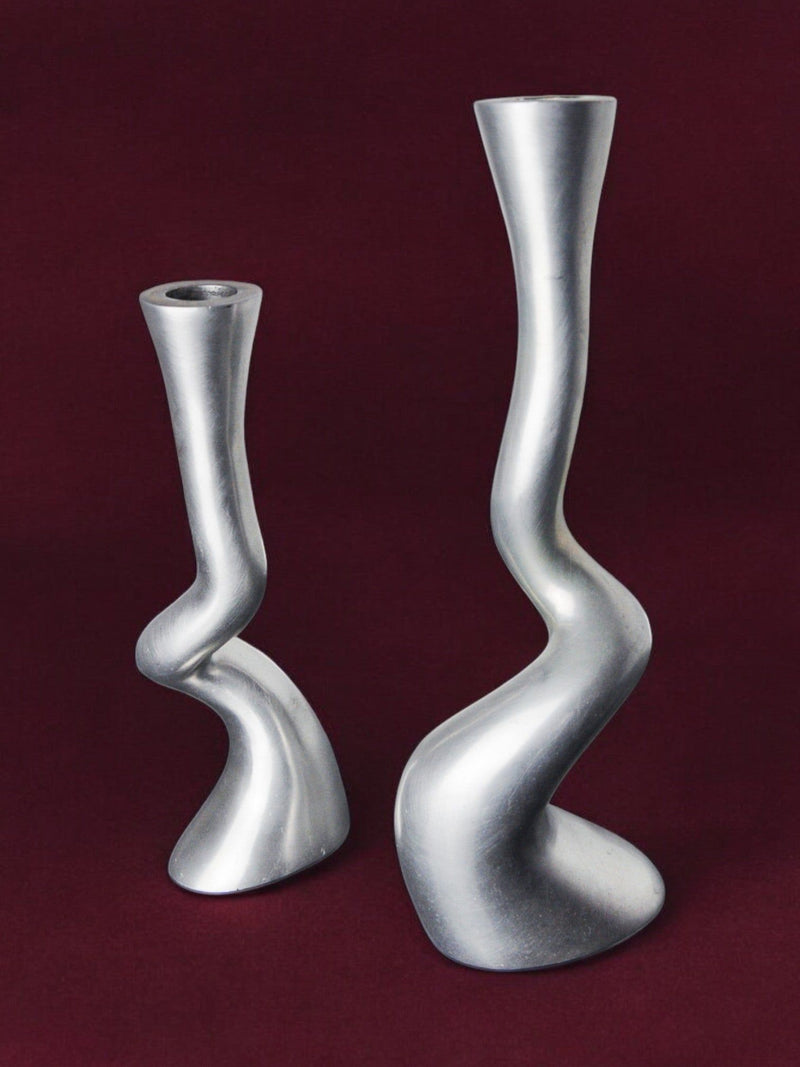 Pair of Brutalist candleholders 1970s — close-up of twisted aluminum design
