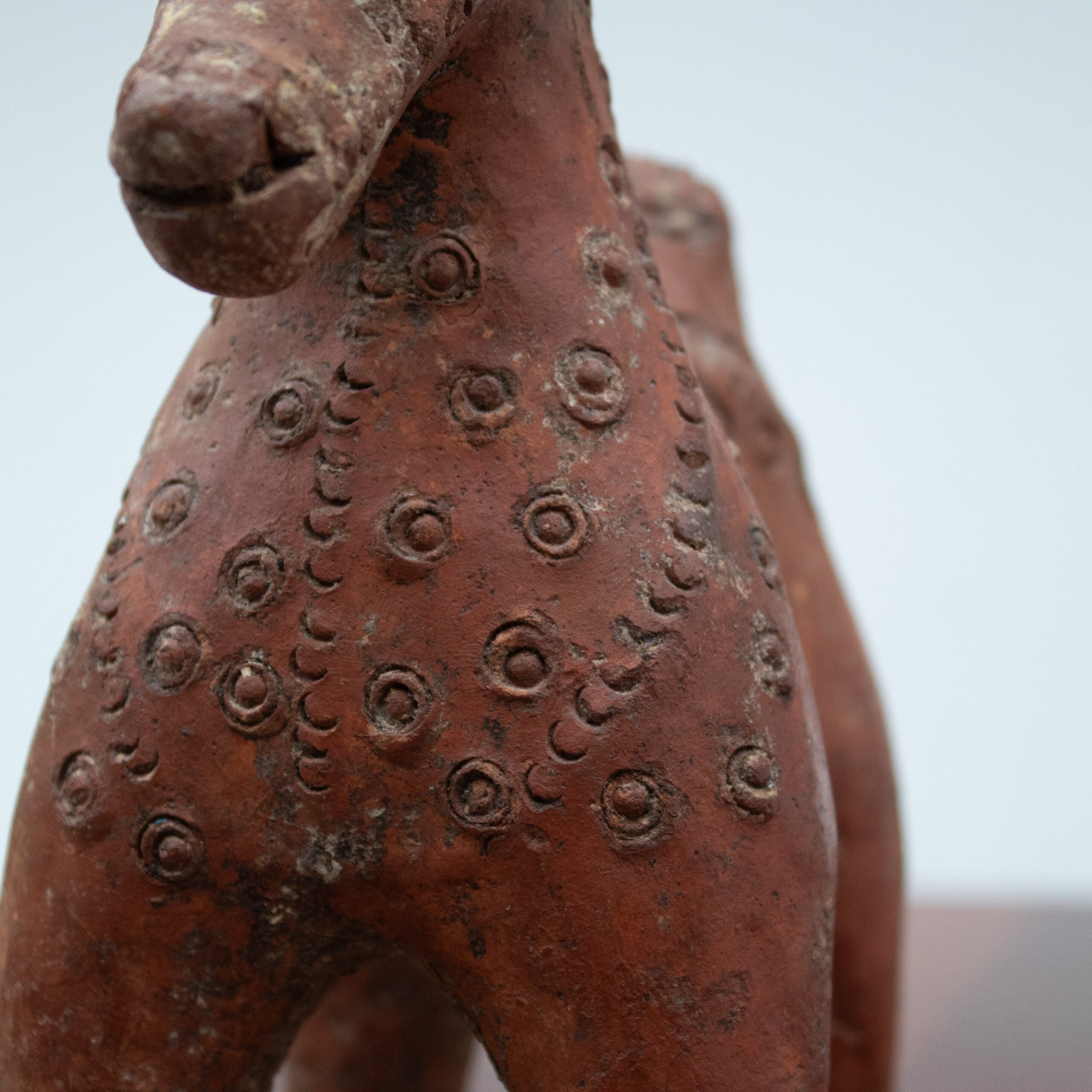 Terracotta Horse Sculpture with Geometric Decoration — close-up