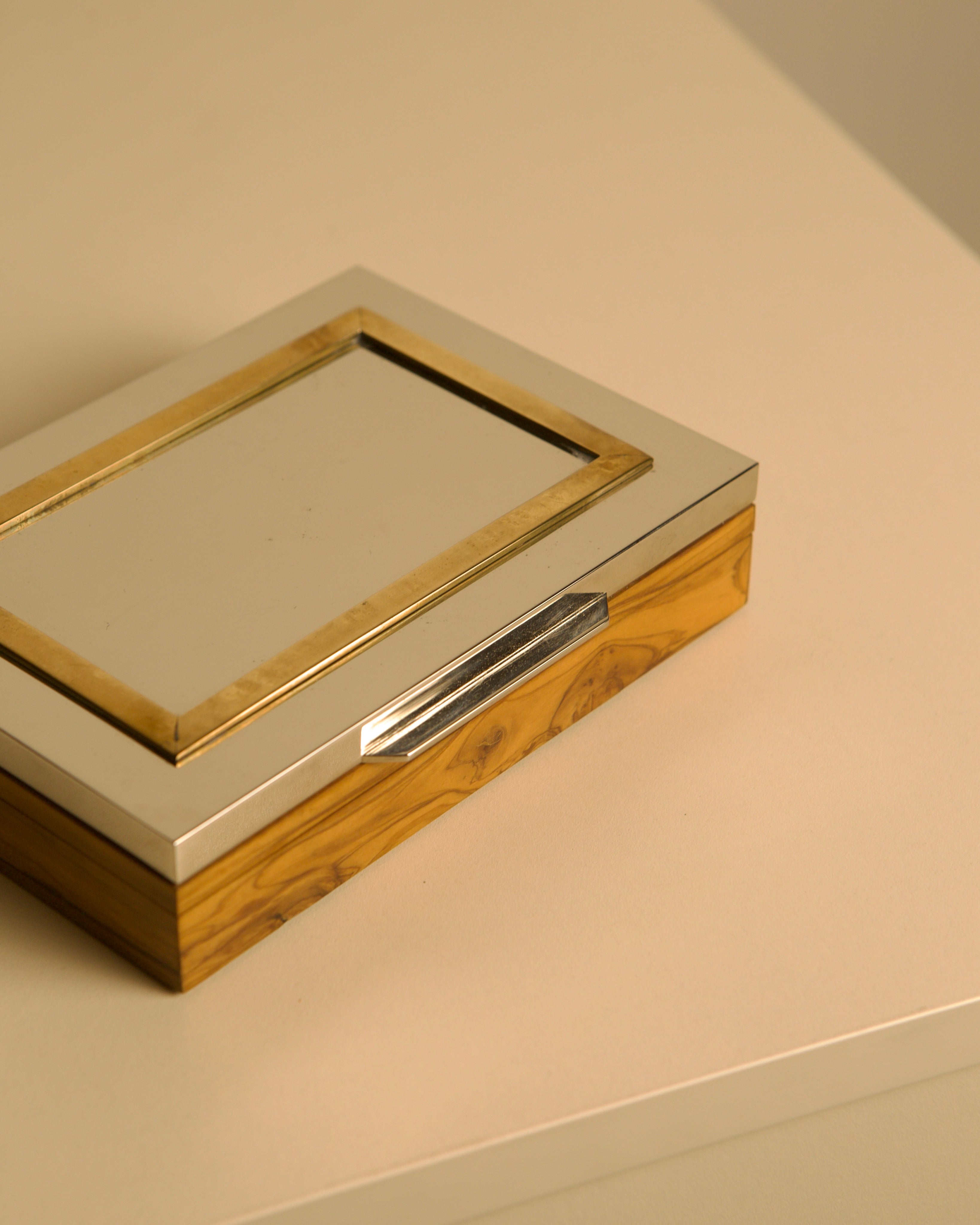 Italian box in metal, brass and solid olive wood, 1970s — side angle showing reflective surface and wooden base