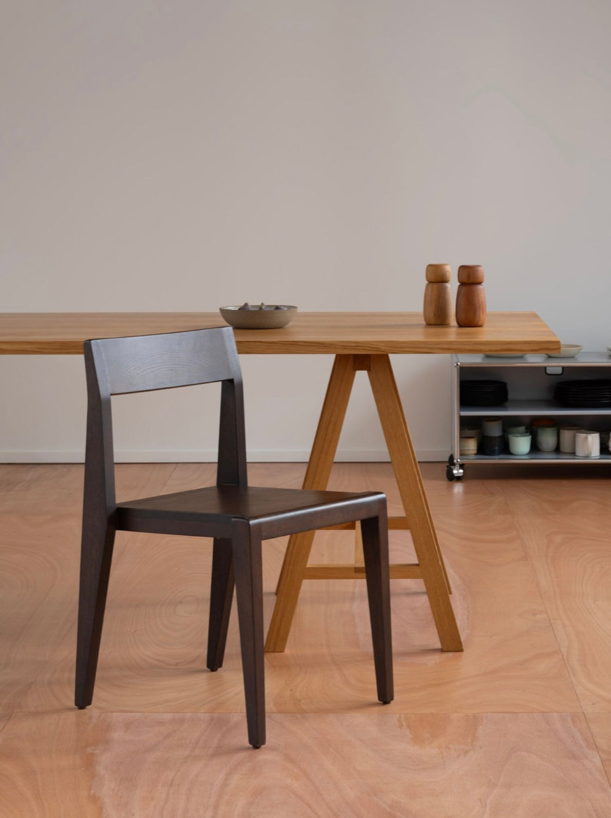 Chair - Ed. Espresso - Oak — top view of dark wood seat in dining setting