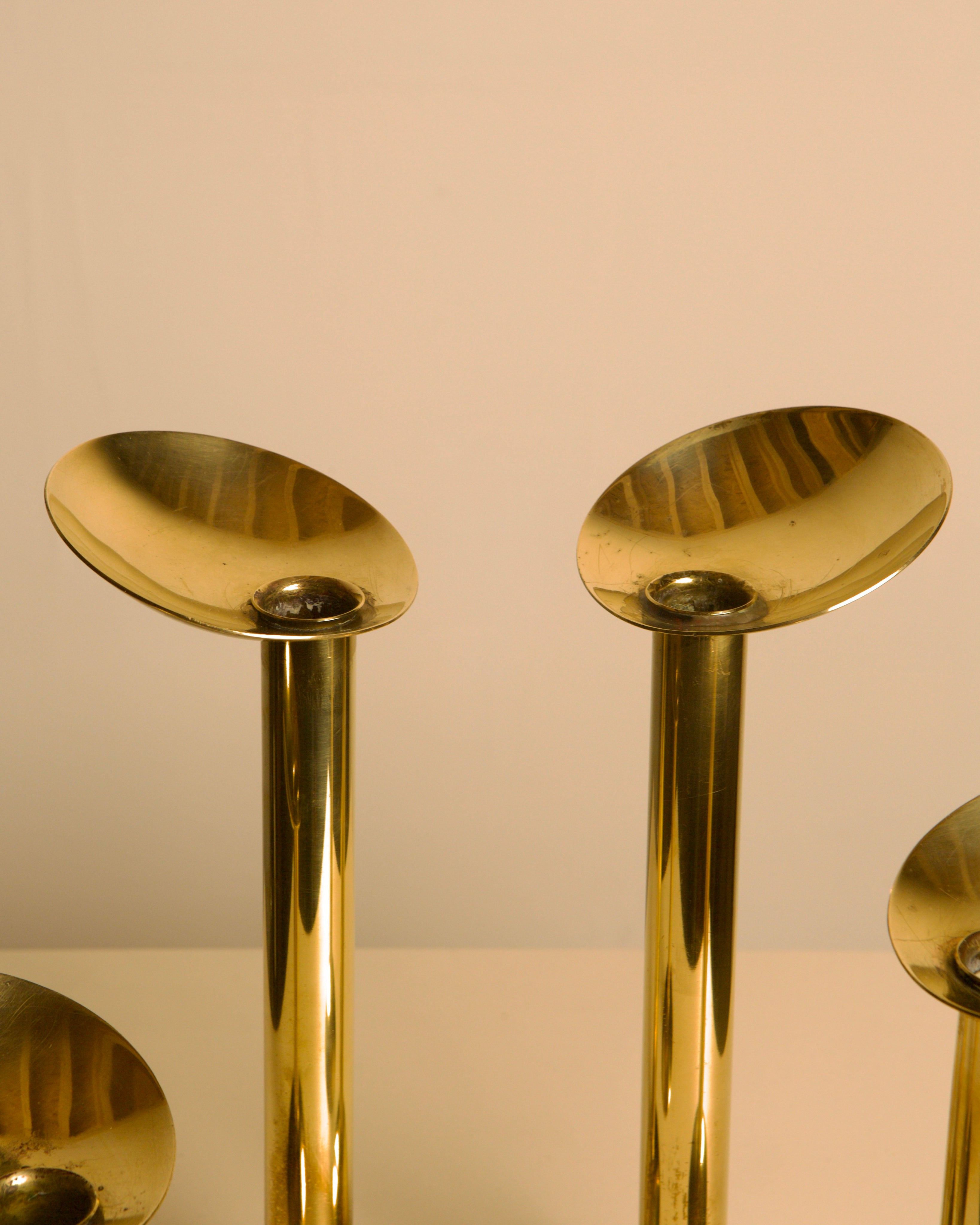 Set of 4 Danish brass candlesticks from the 1960s — close-up