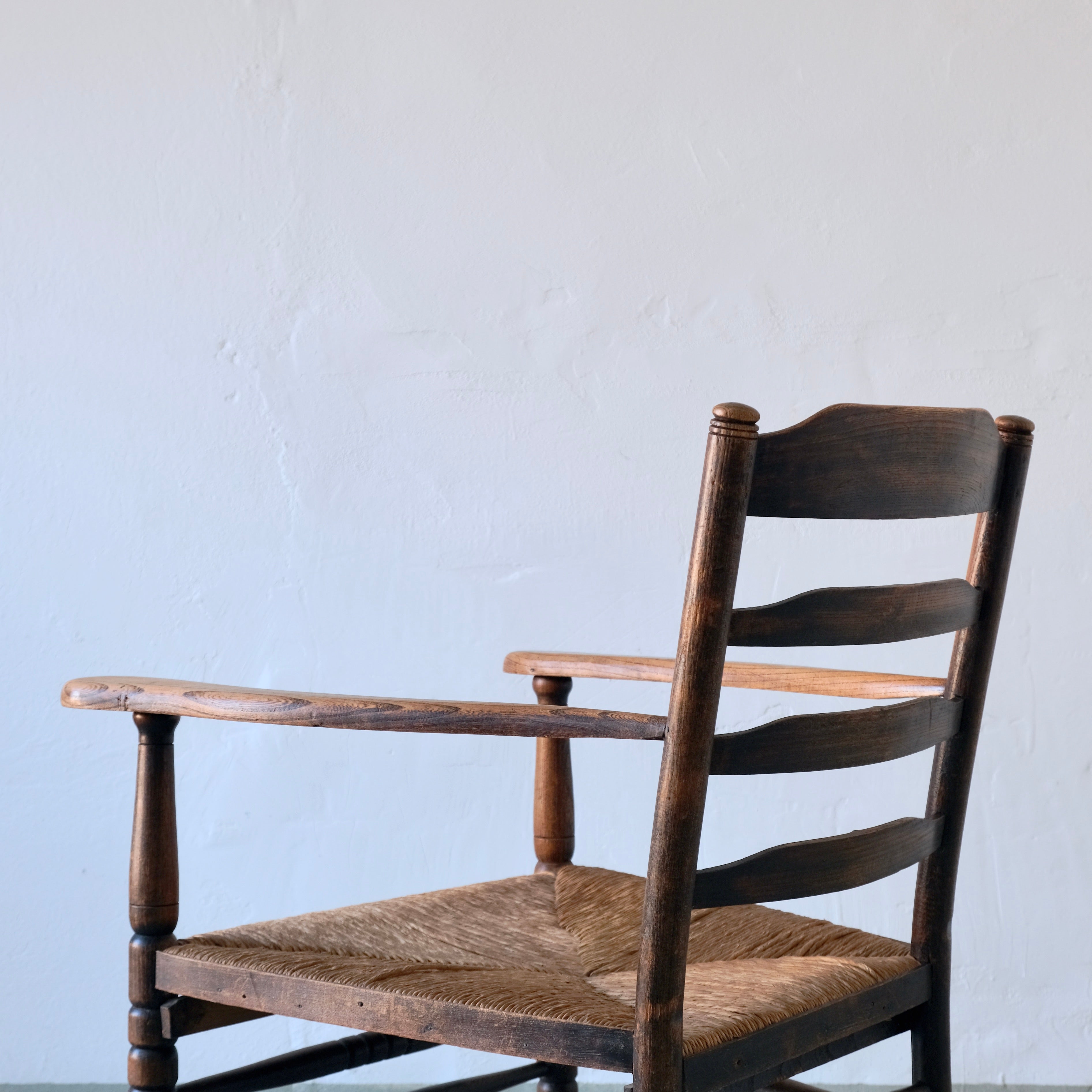 Rustic Bobbin Rush Seat Low Armchair | Netherlands | 1940s — close-up
