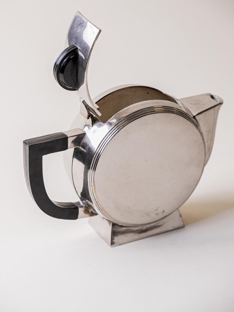 Art Deco Silver Plated Teapot — angled view on neutral background