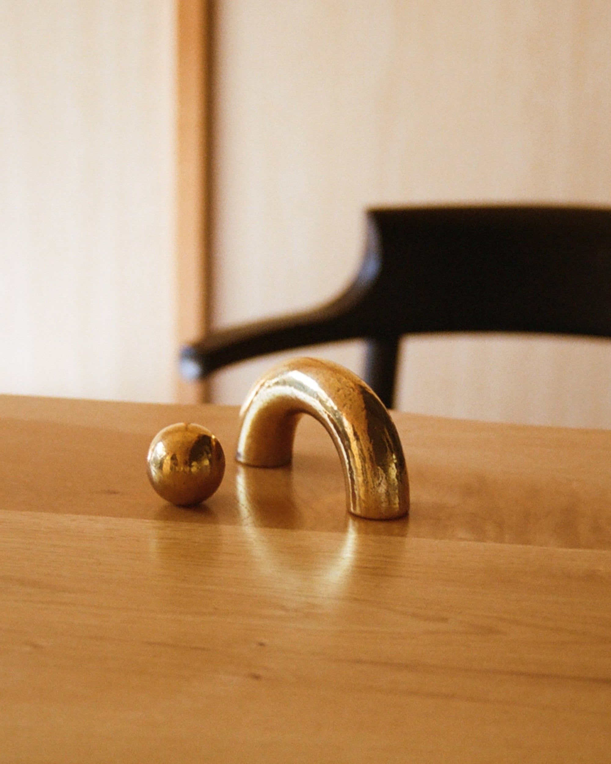 CERCLE Cabinet Pull Thick — close-up of brass pull on wooden surface