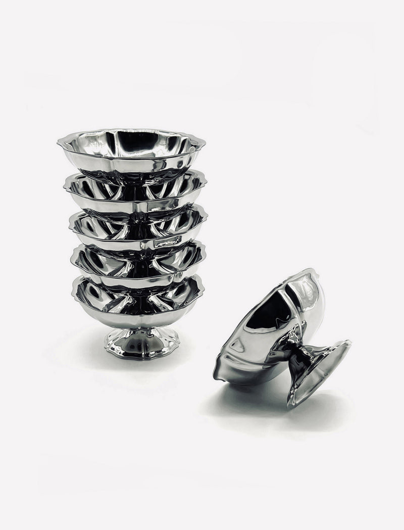 Set of six vintage stainless steel ice cream coupes stacked together