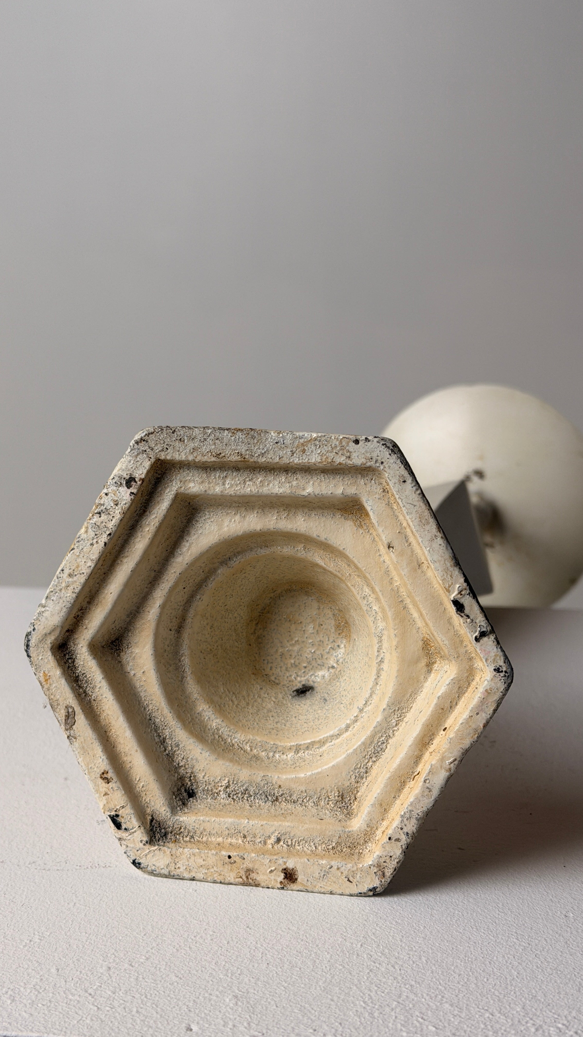 White-patinated Iron Candlestick, France, early 20th century — top view of hexagonal base