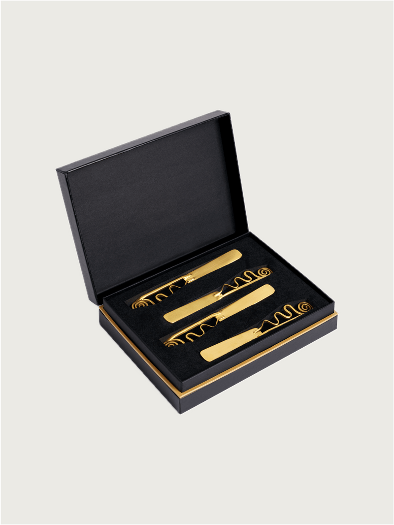 Set of 4 Spirale Spreaders — close-up of gold-toned spreaders in box