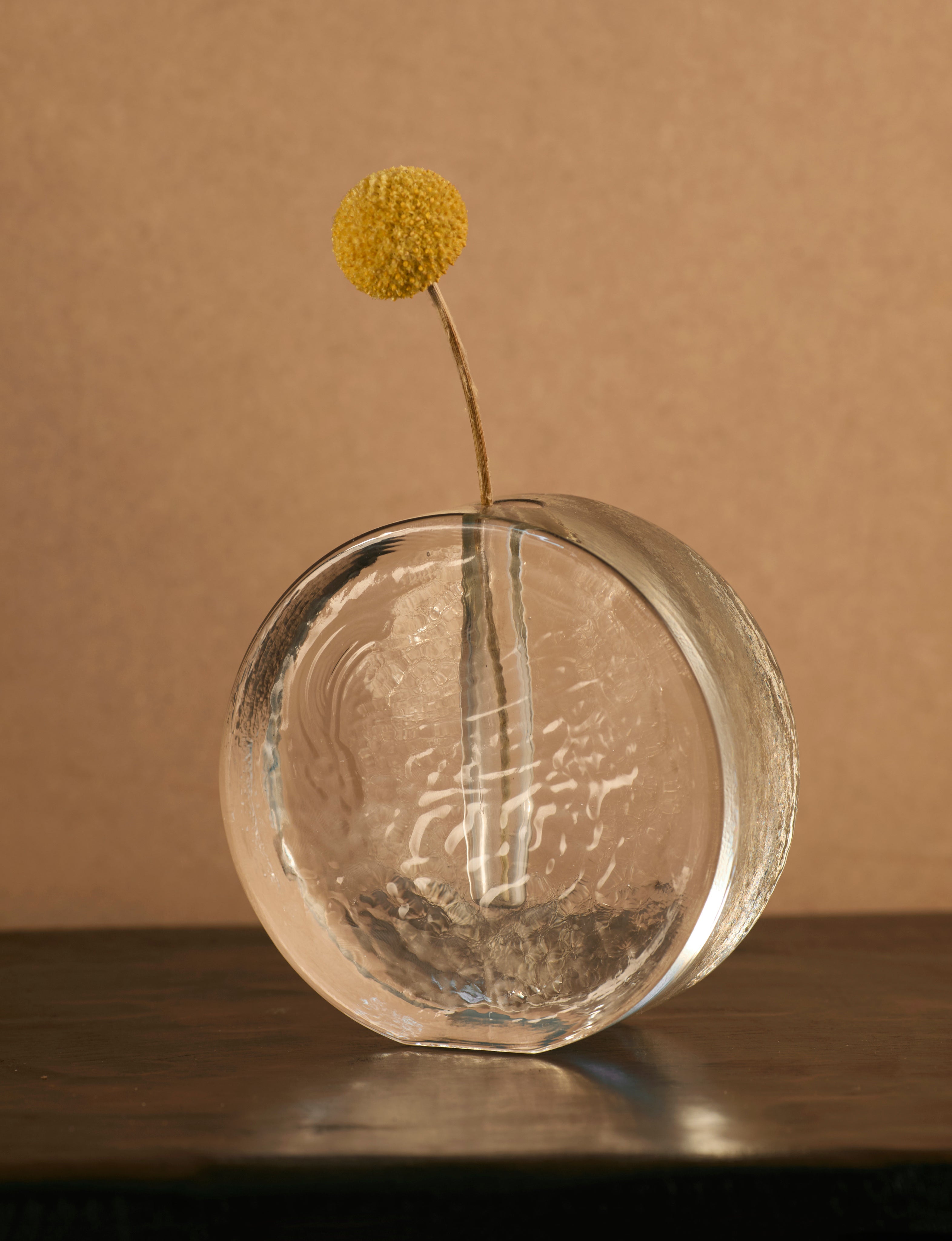 Vintage Scandinavian Vase in Glass c. 1960 — front view with yellow flower on wooden table