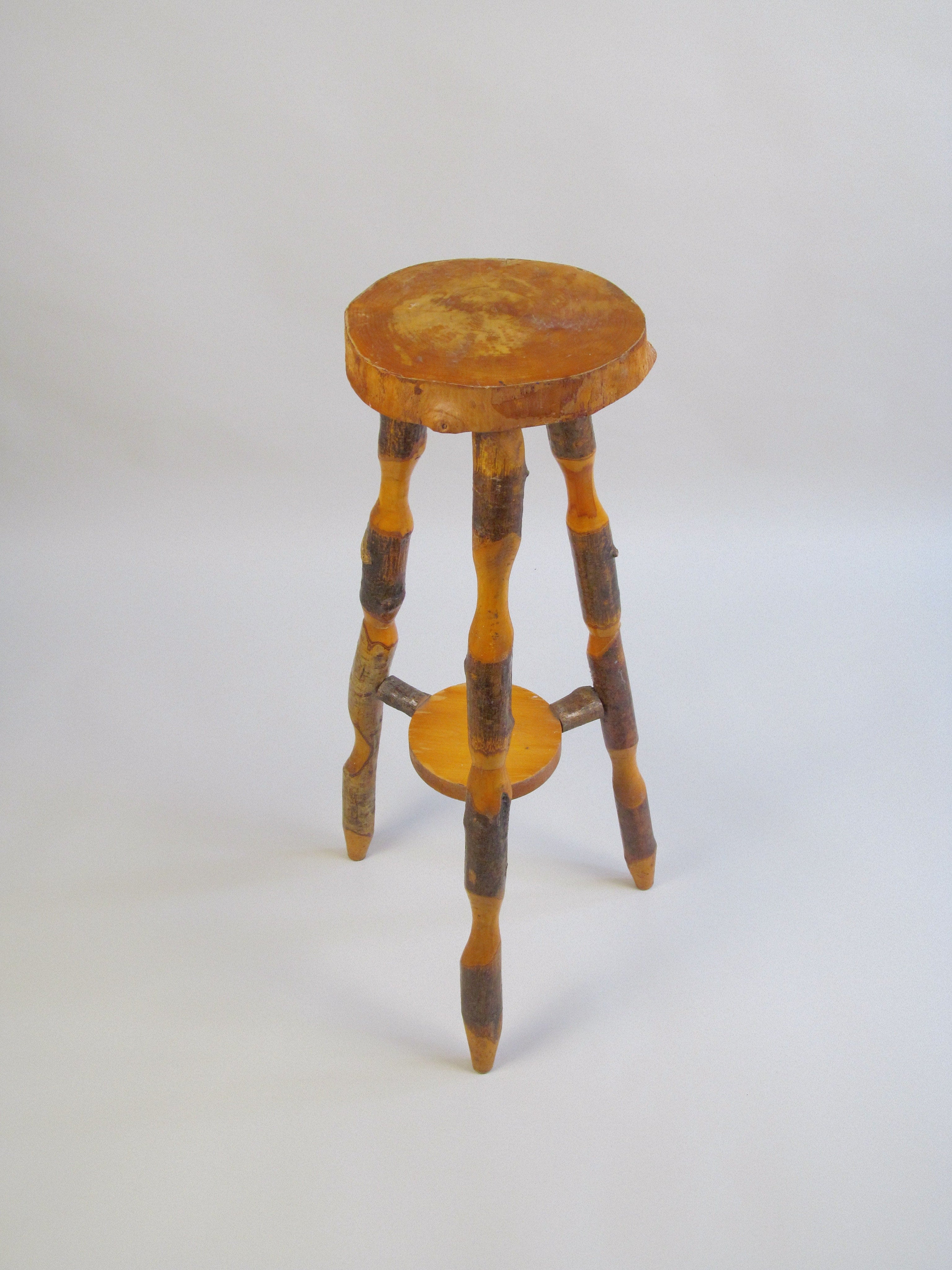 Naturalistic Wooden End Table — angled view showing handcrafted wooden legs