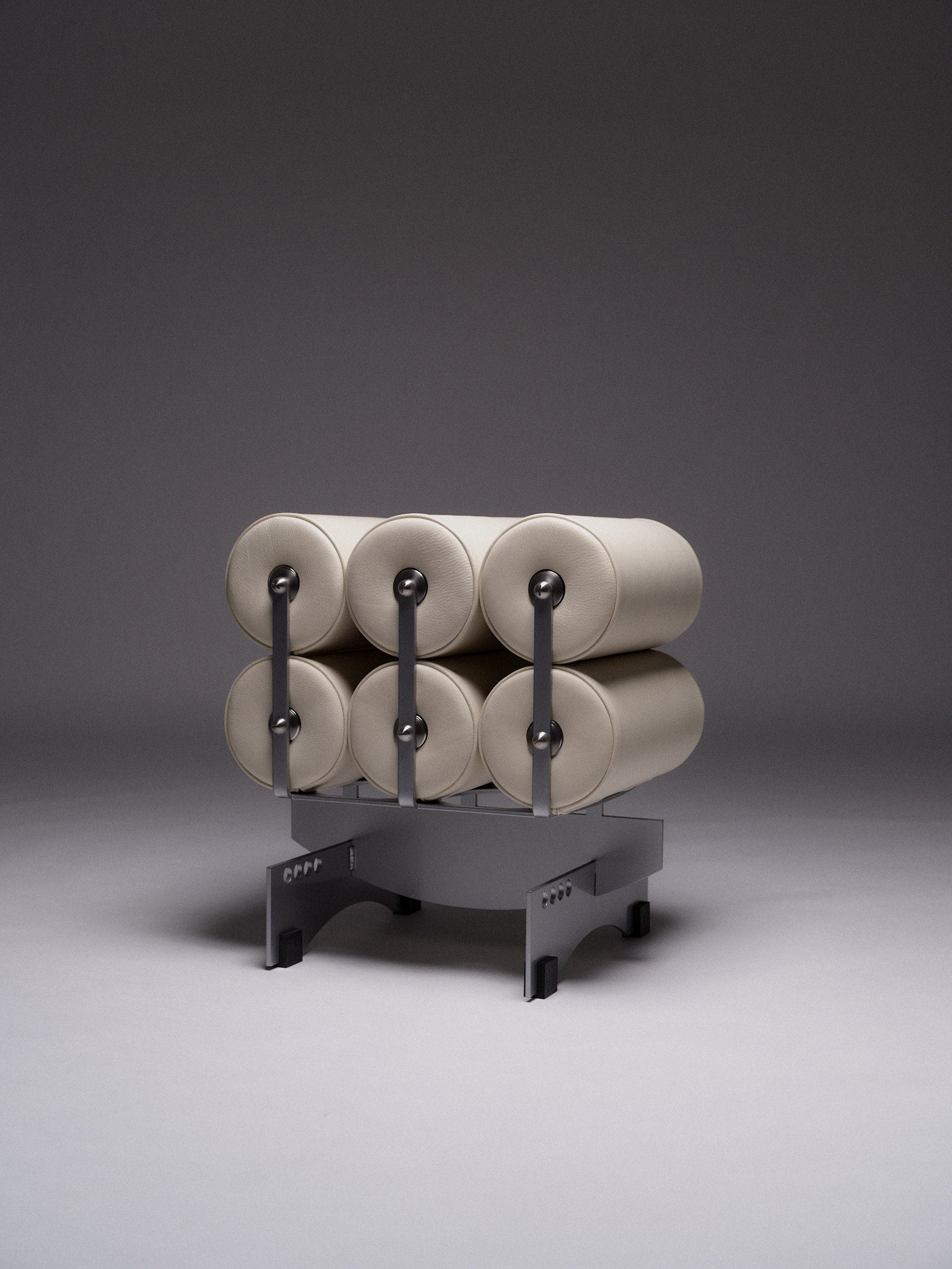 Poggia Alta — front view of cream upholstered chair on gray backdrop