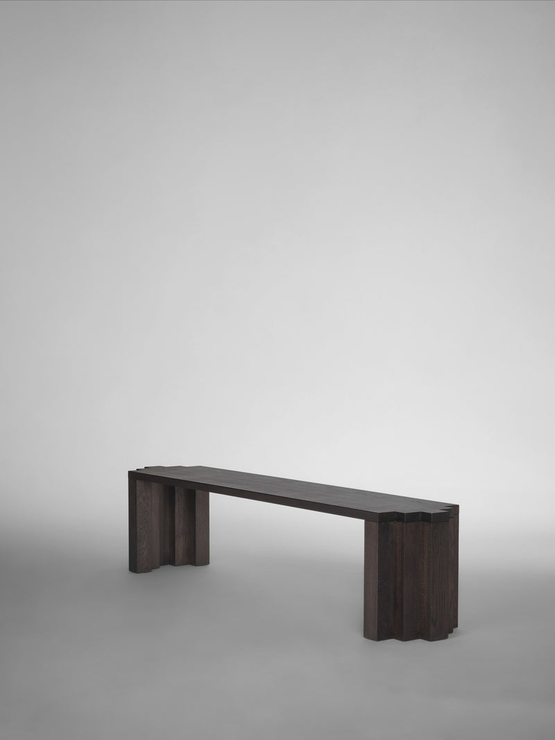 Cadence Bench — side view of dark wood structure