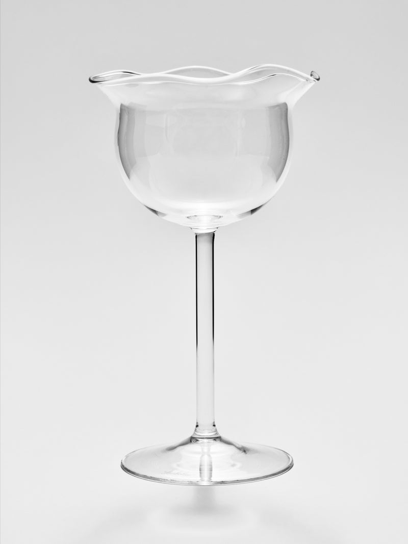 Clear glass wine goblet with decorative wavy rim by AMBELIER